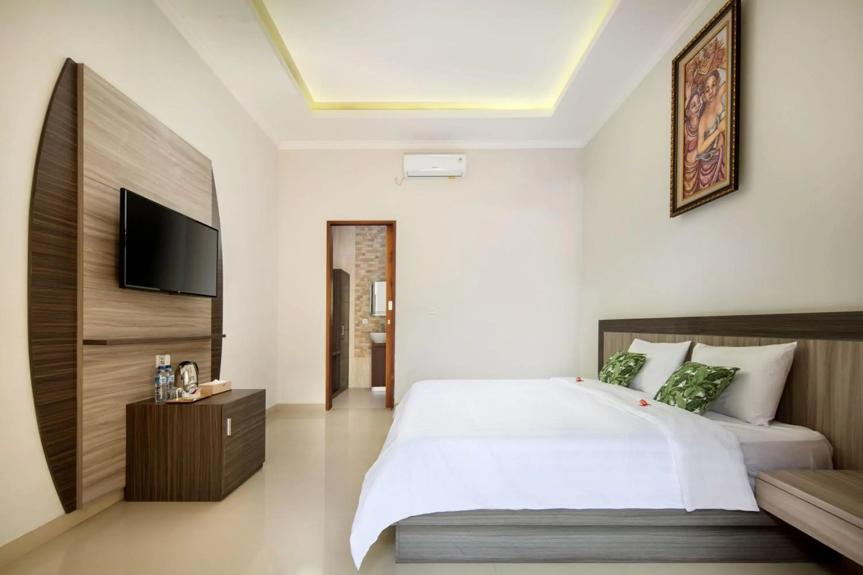 TV and multimedia, Bed in Jineswari Kuta by Kamara TV and multimedia, Bed in Jineswari Kuta by Kamara