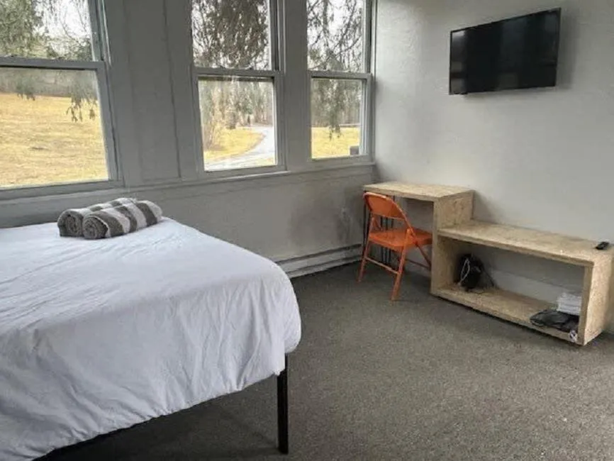 Bed in The Brooks Motel