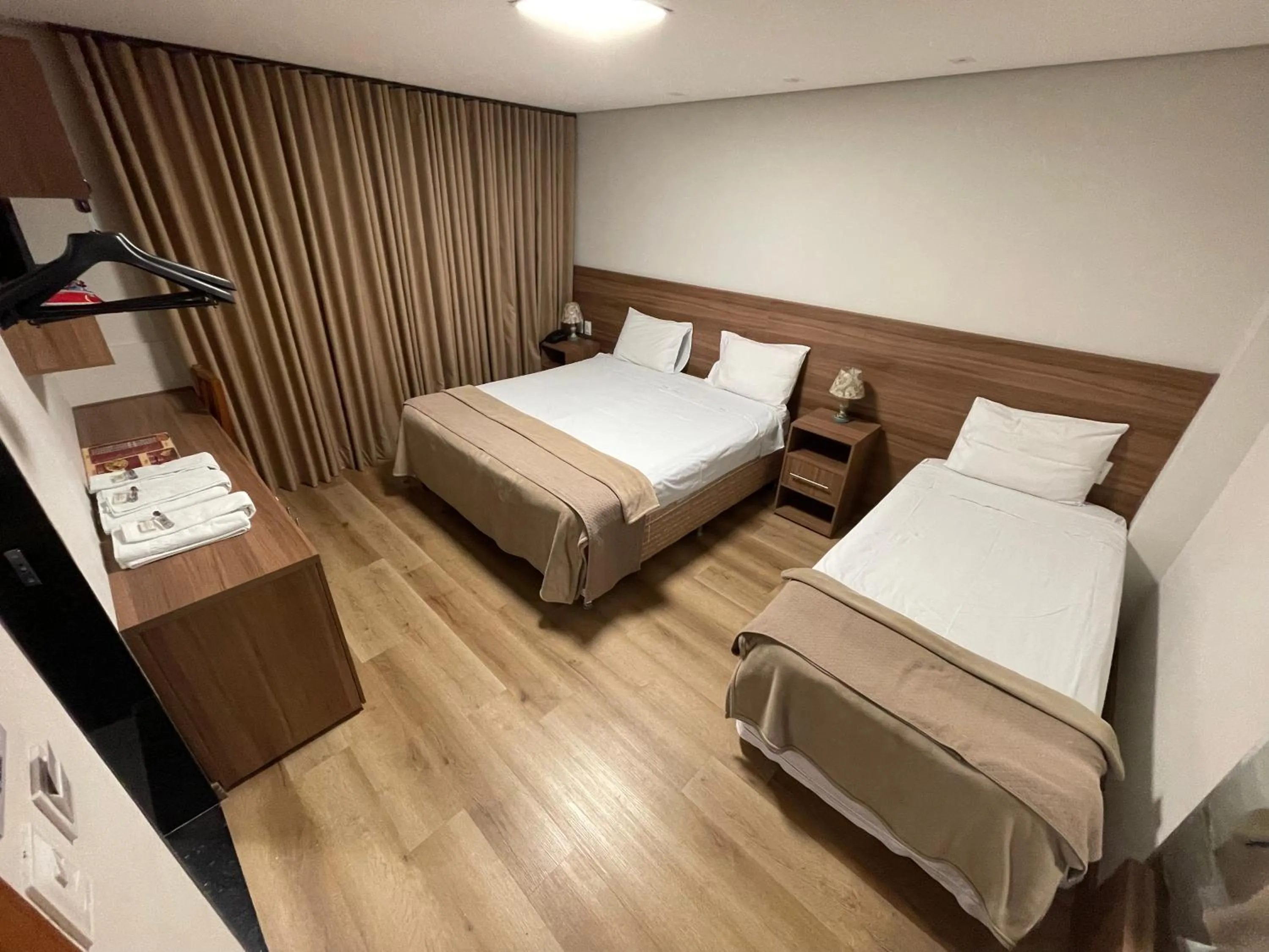 Bed in Pousada Circuito dos Inconfidentes