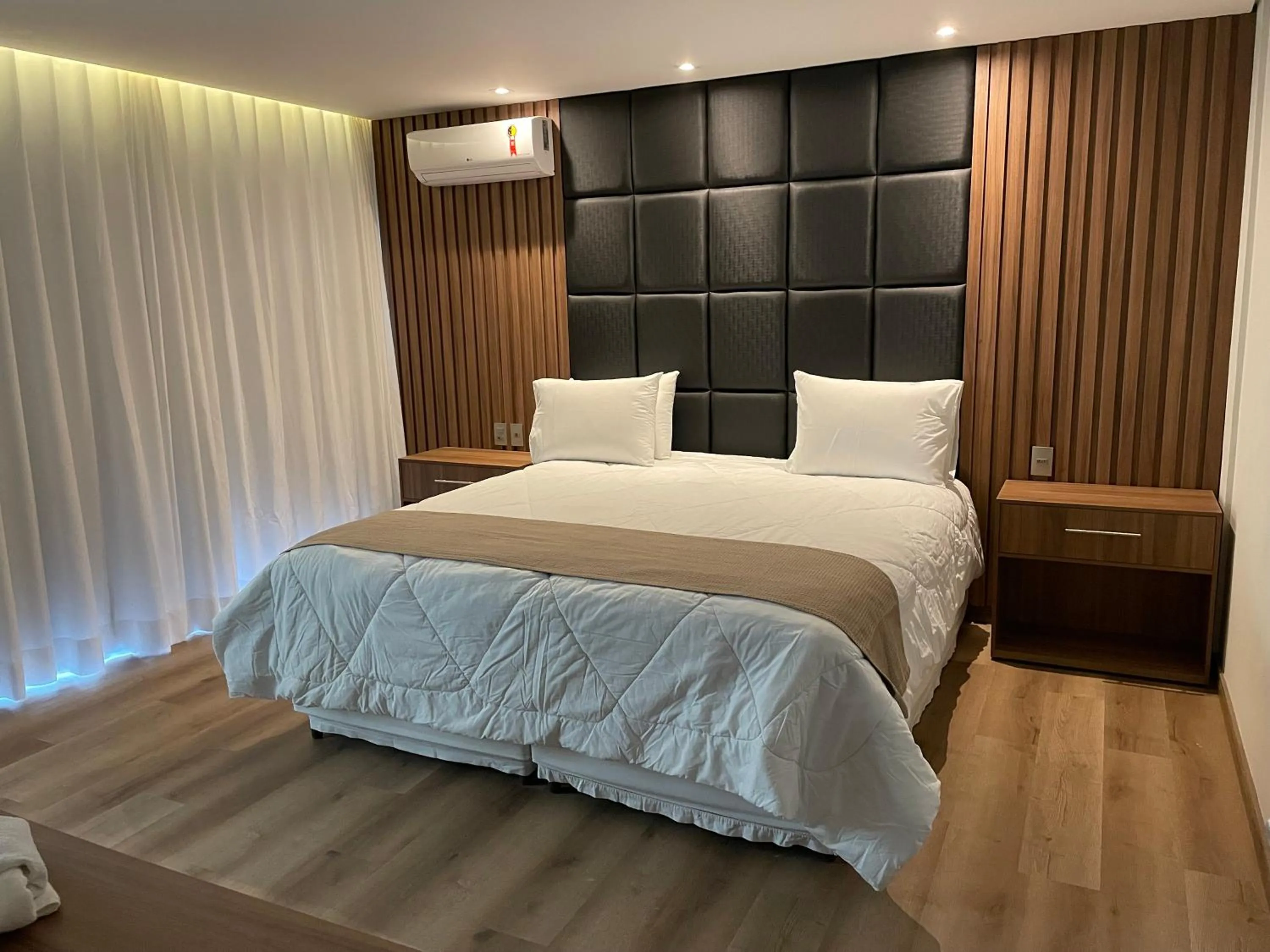 Bed in Pousada Circuito dos Inconfidentes