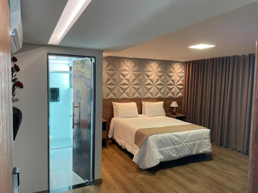 Bed in Pousada Circuito dos Inconfidentes