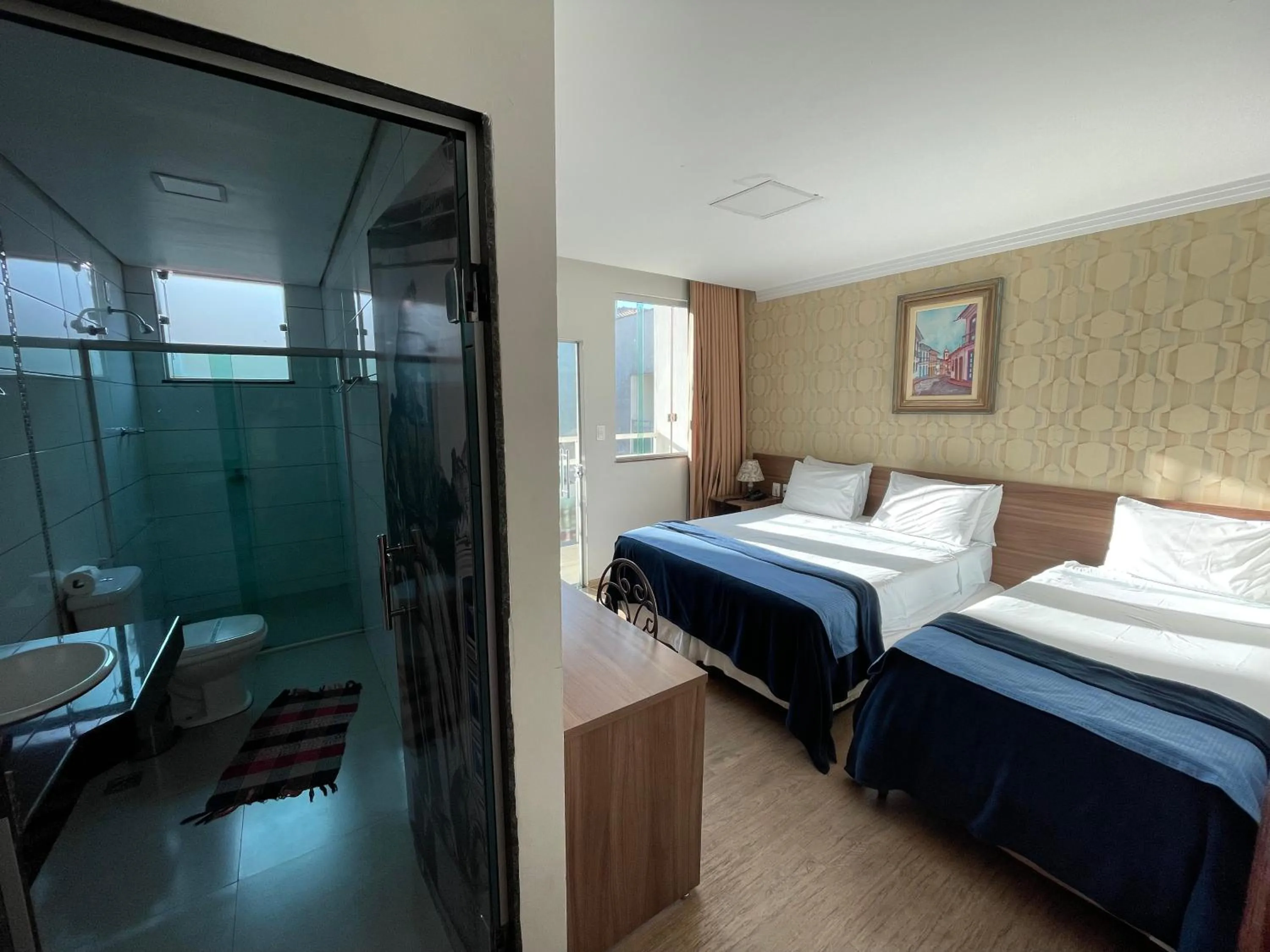 Bed in Pousada Circuito dos Inconfidentes