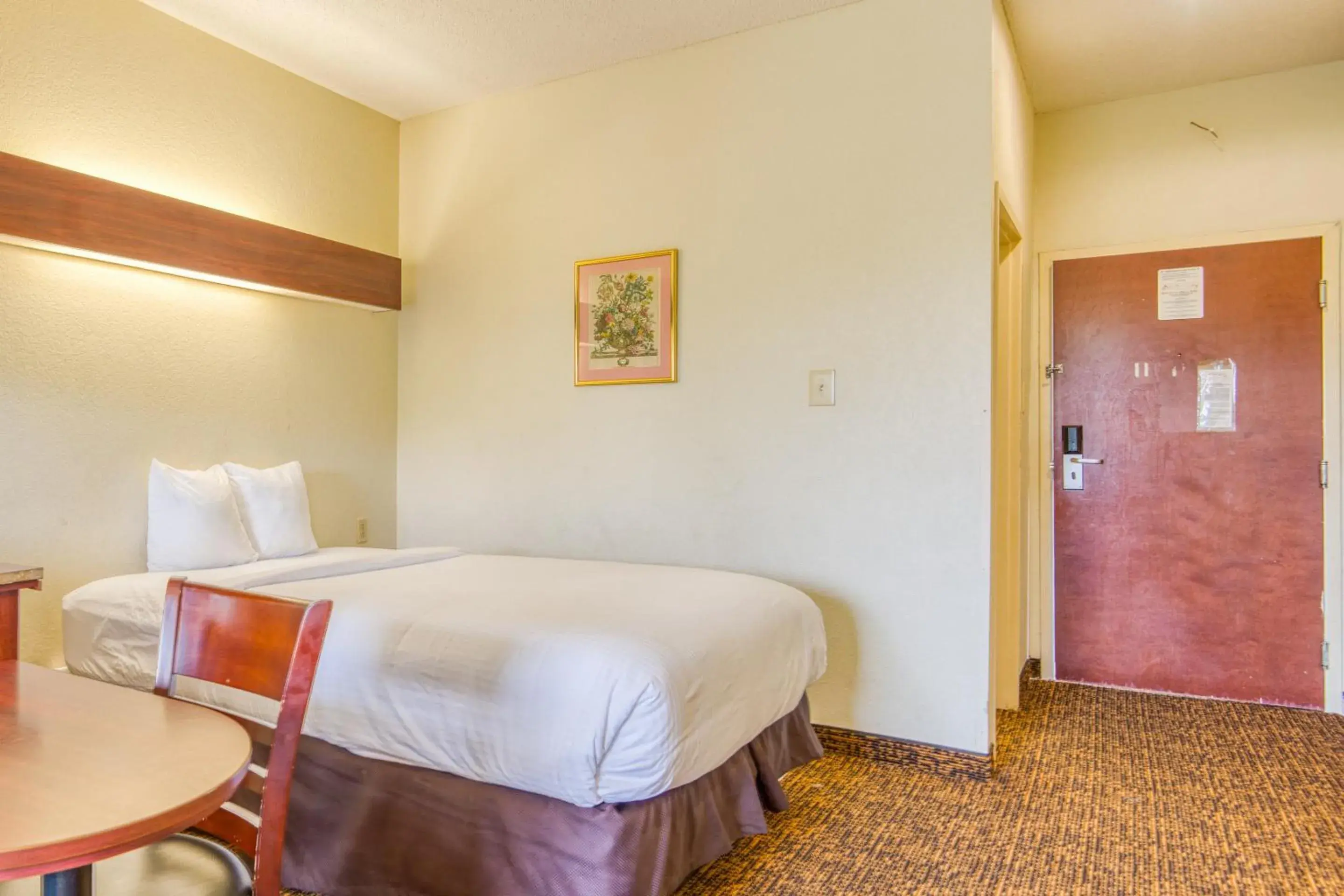 Bedroom, Bed in Trident Inn & Suites, Baton Rouge Bedroom, Bed in Trident Inn & Suites, Baton Rouge