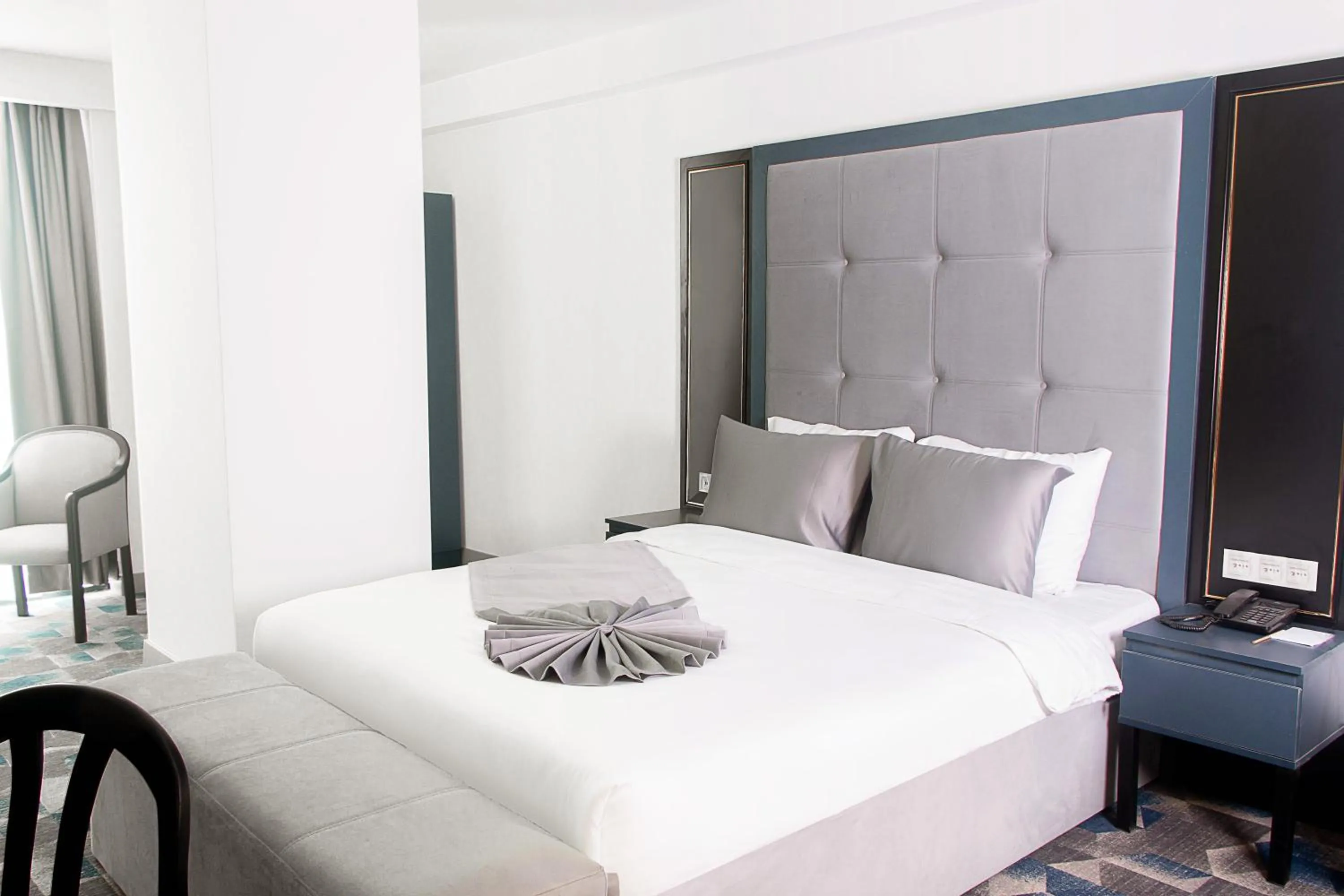 Bed in Shelter Inn Hotel & Spa