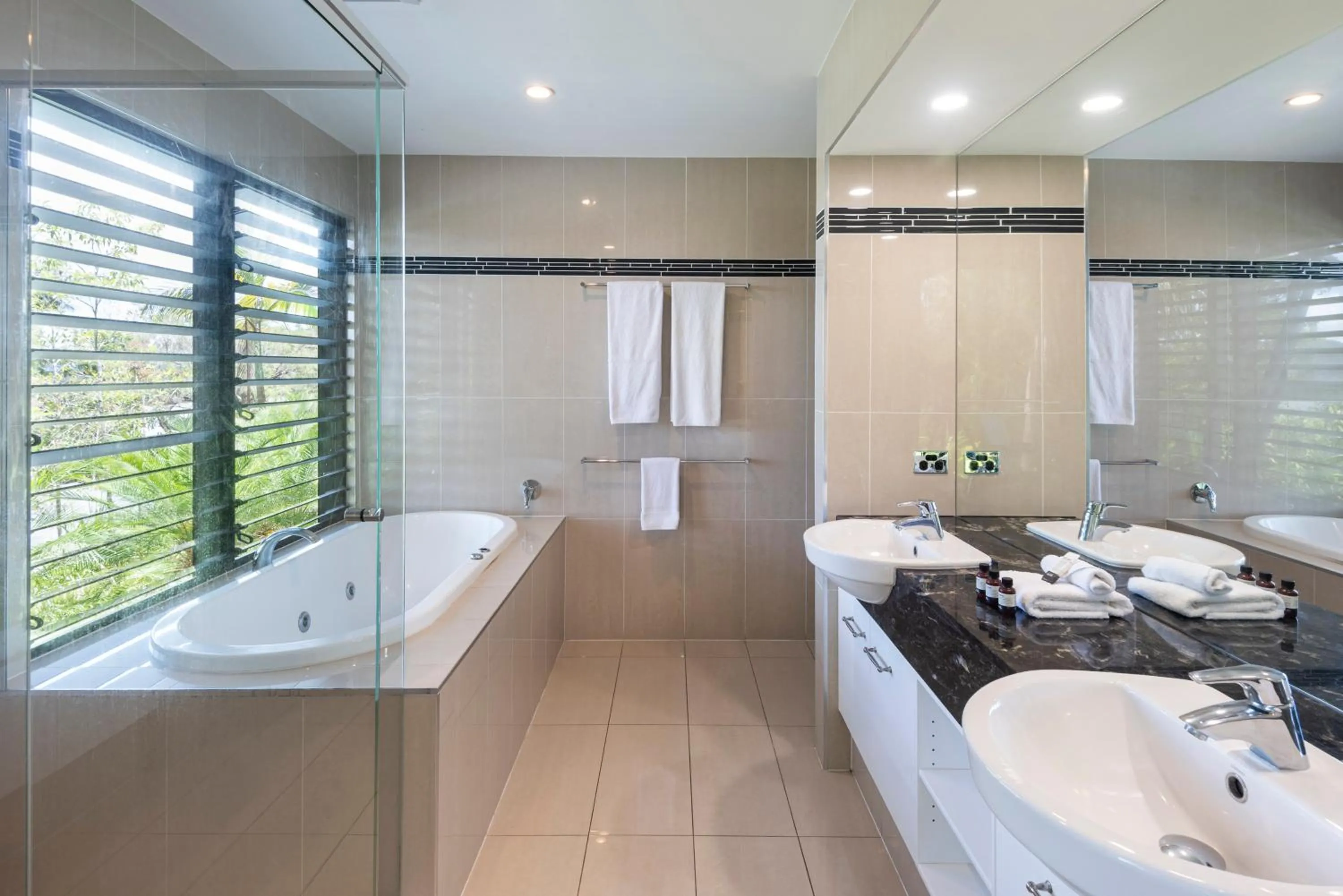 Bathroom in Pinnacle Apartments on Hamilton Island by HIHA