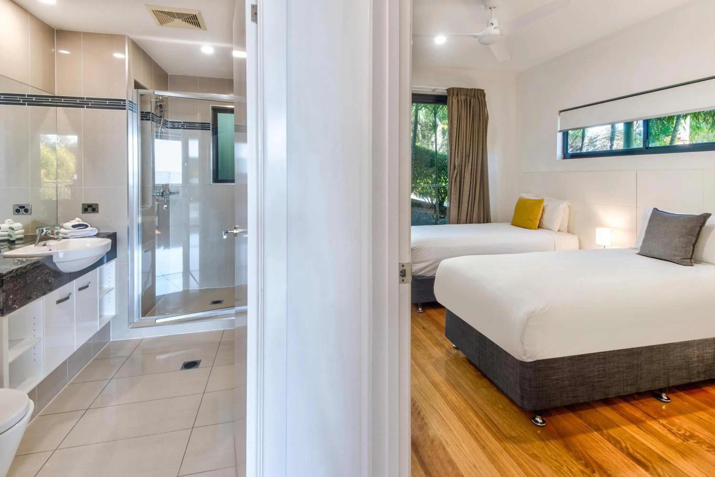 Bathroom, Bed in Pinnacle Apartments on Hamilton Island by HIHA