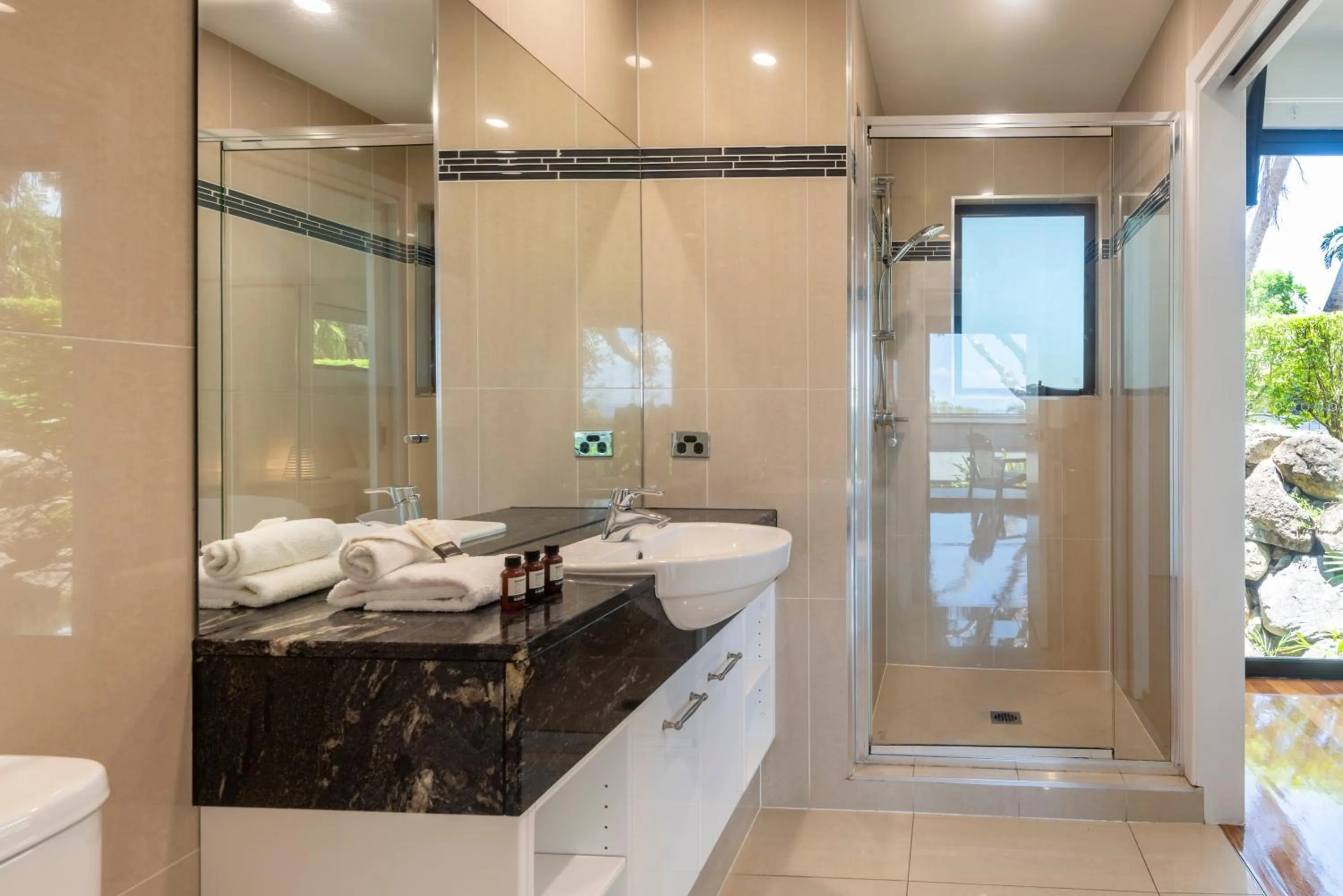 Bathroom in Pinnacle Apartments on Hamilton Island by HIHA