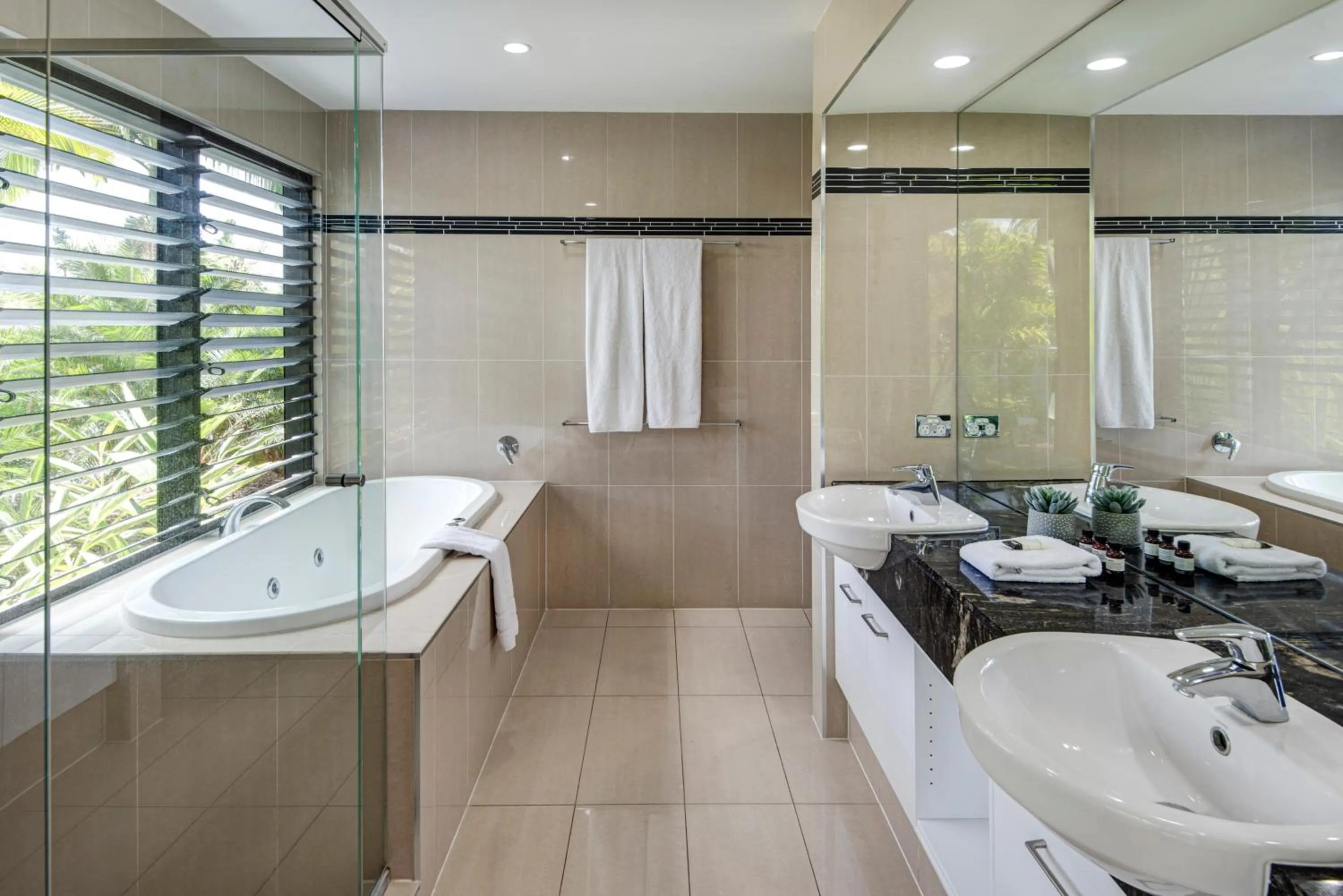 Bathroom in Pinnacle Apartments on Hamilton Island by HIHA