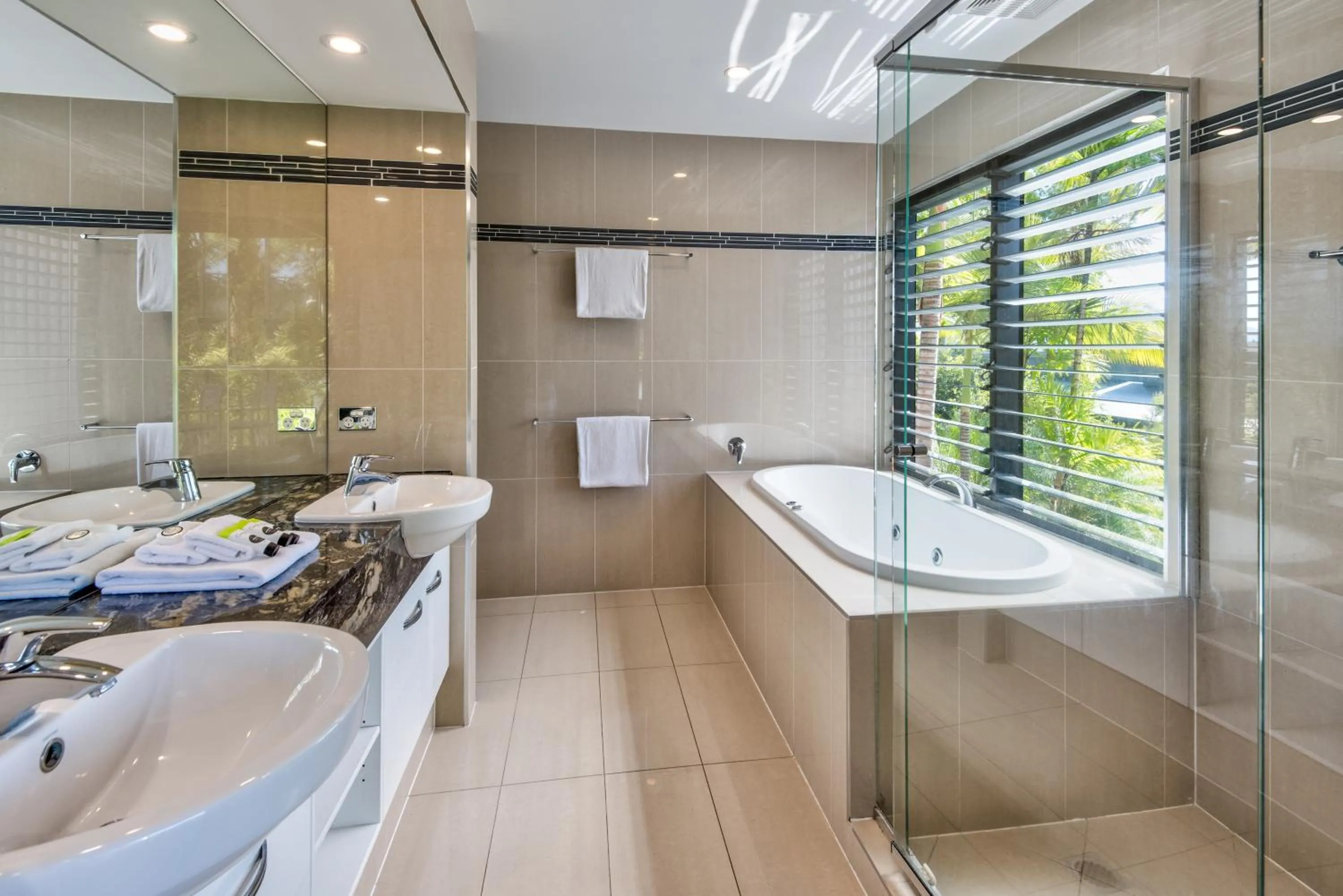 Bathroom in Pinnacle Apartments on Hamilton Island by HIHA