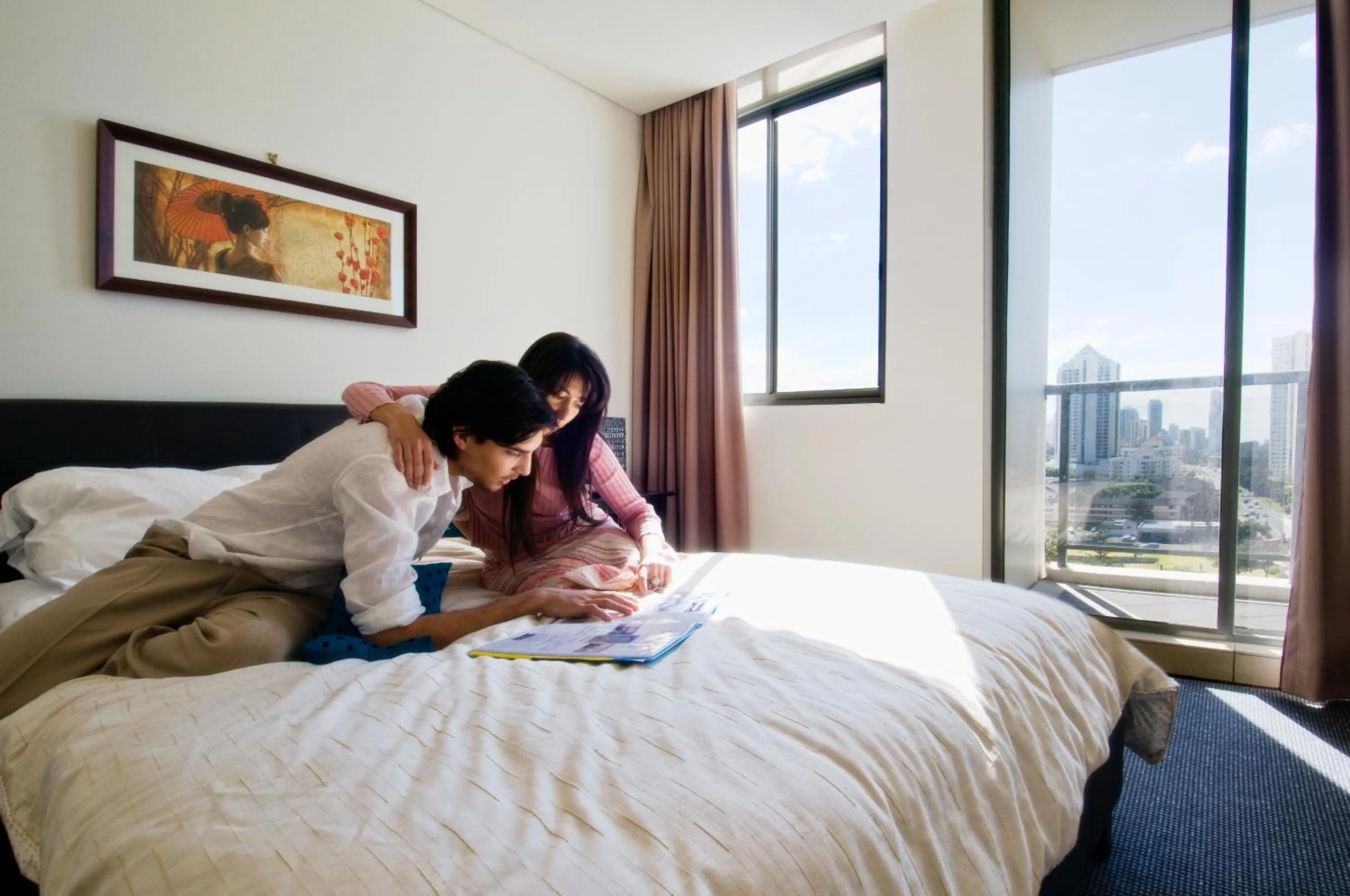 Bed in Solaire Apartments