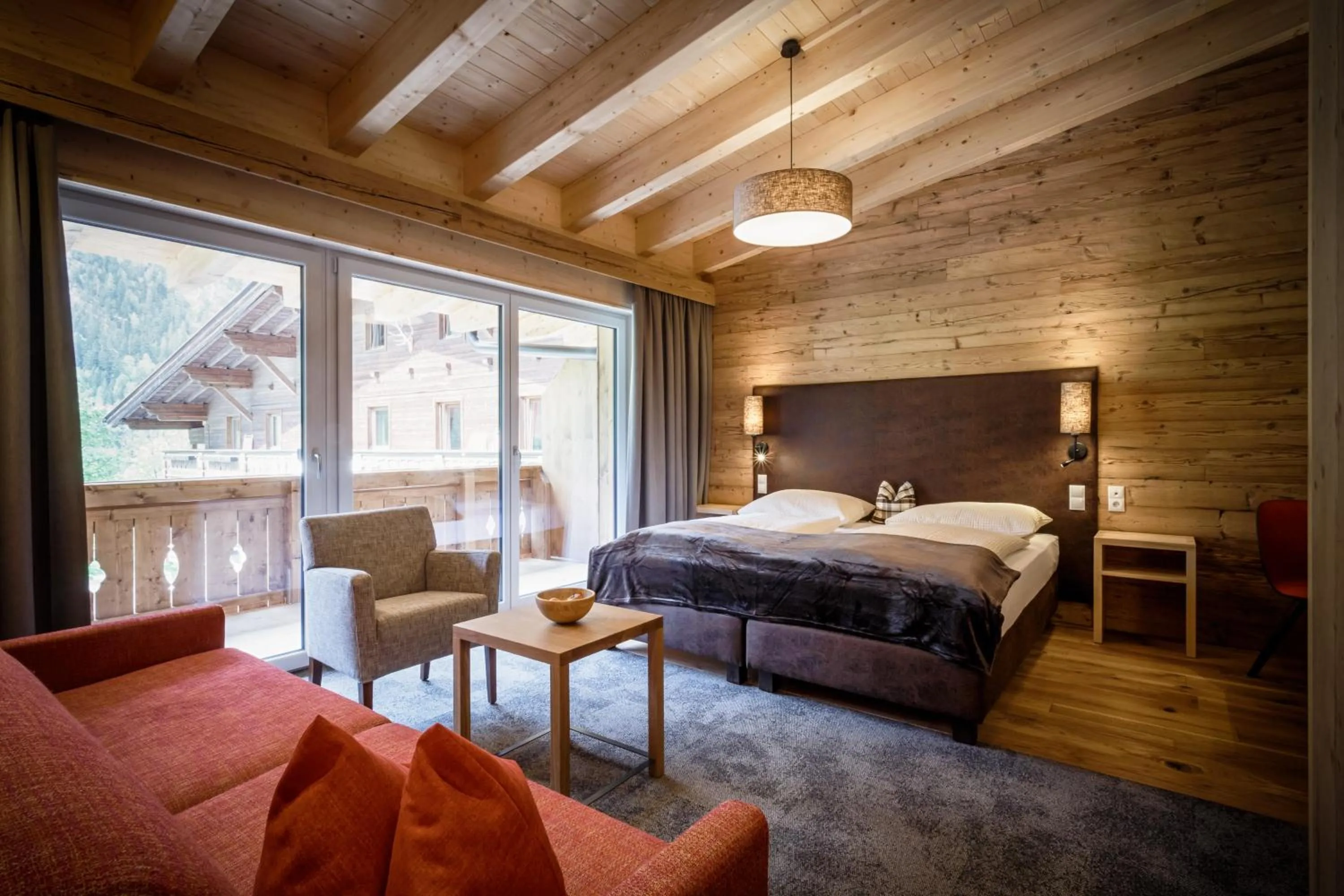 Balcony/Terrace, Bed in Das Naturhotel die Eng