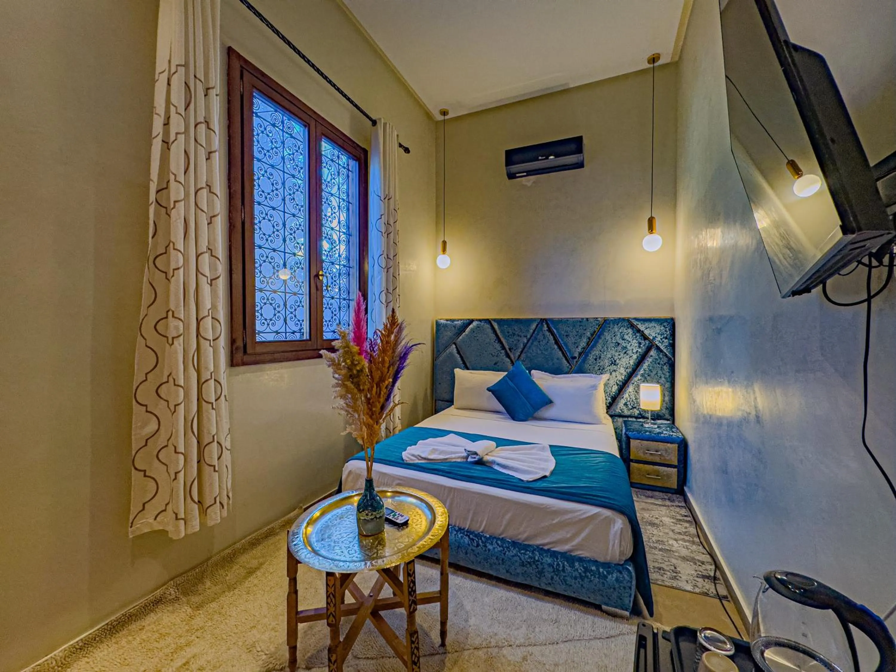 Bed in Riad Azia