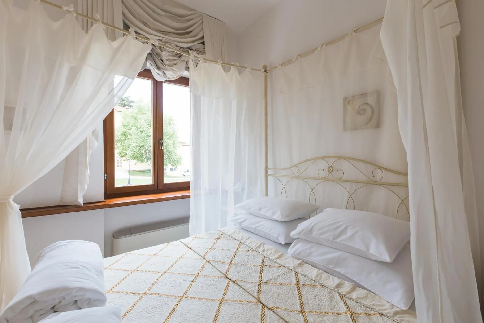 Bed in Palazzo Angelica B&B Adults Only