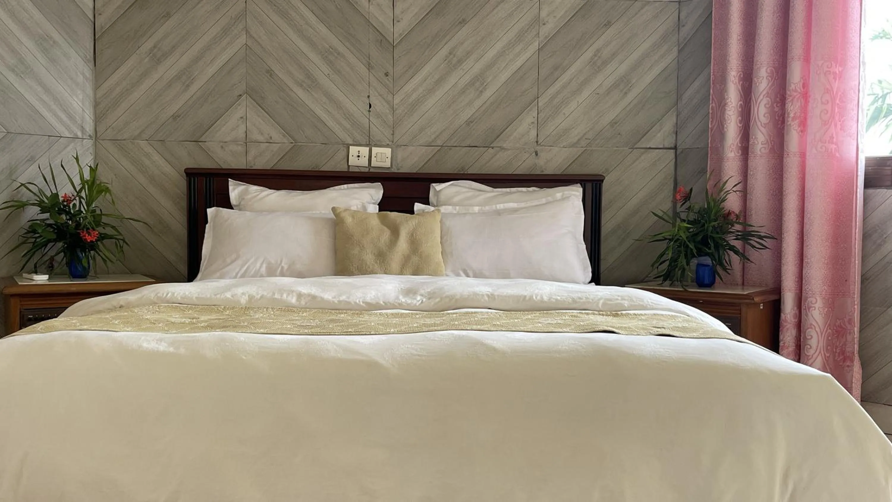 Bed in Hotel les Polygones Kribi