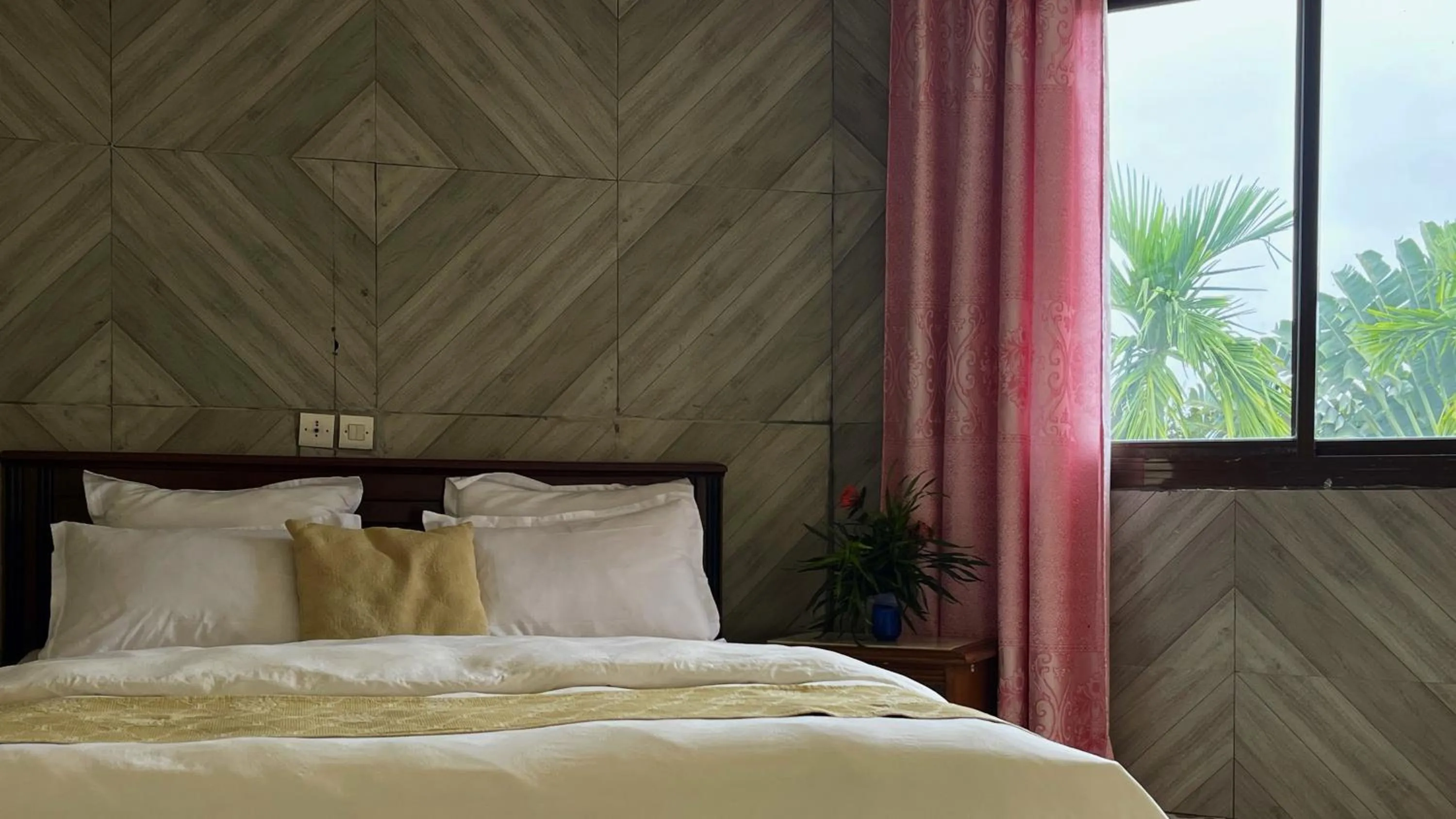 Bed in Hotel les Polygones Kribi