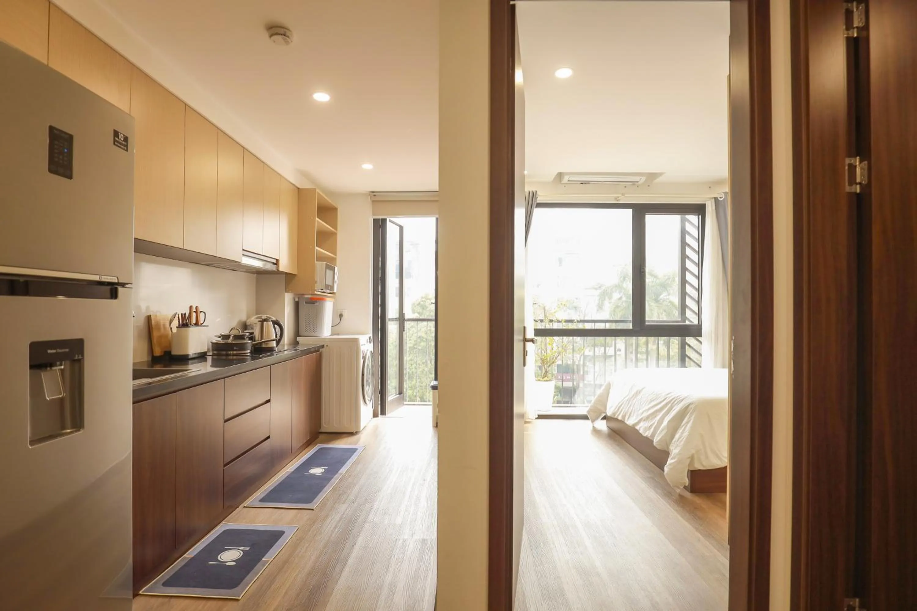 kitchen, Bed in Wins Apartment