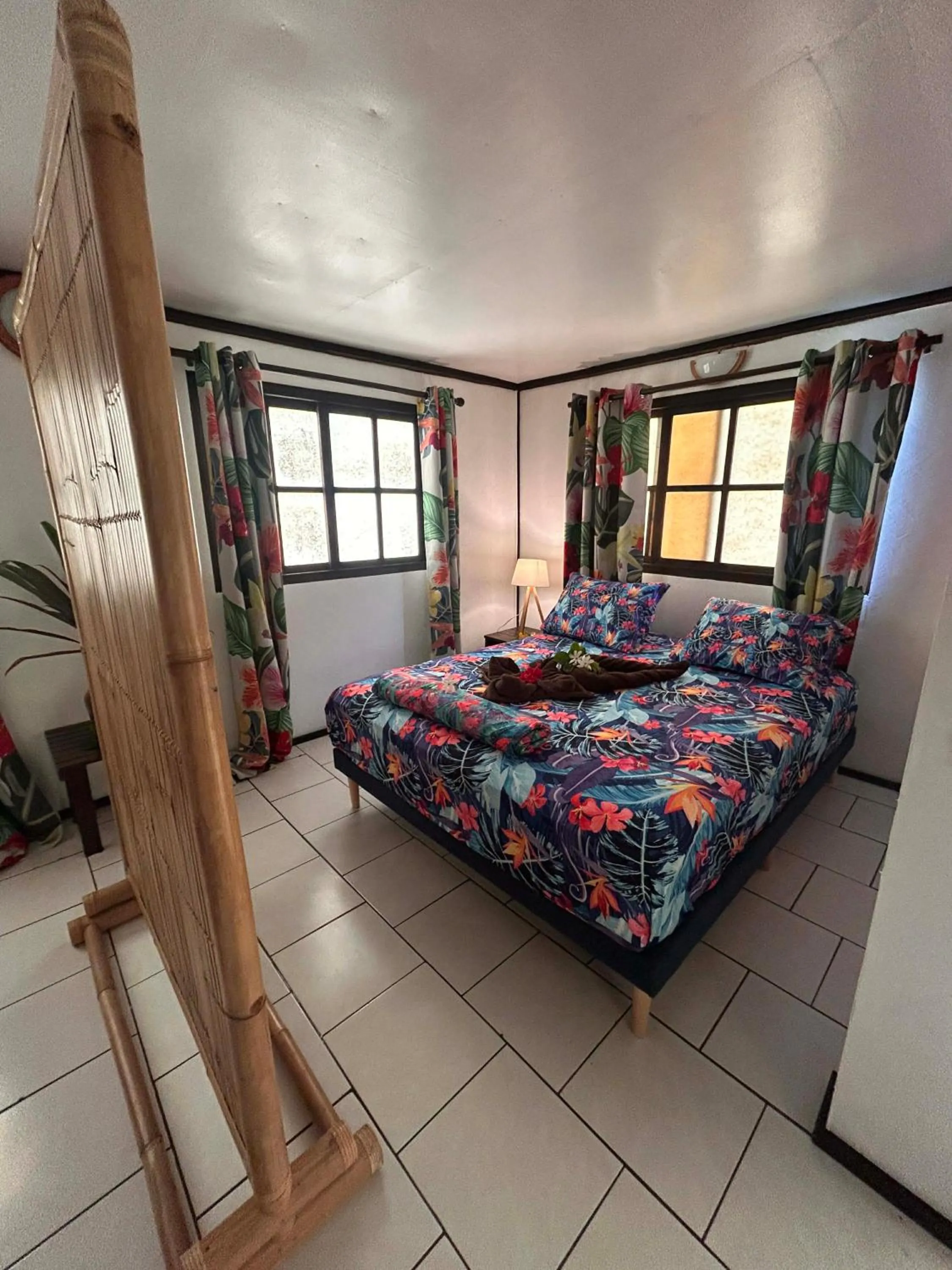 Property building, Bed in Pension Hibiscus Taha'a
