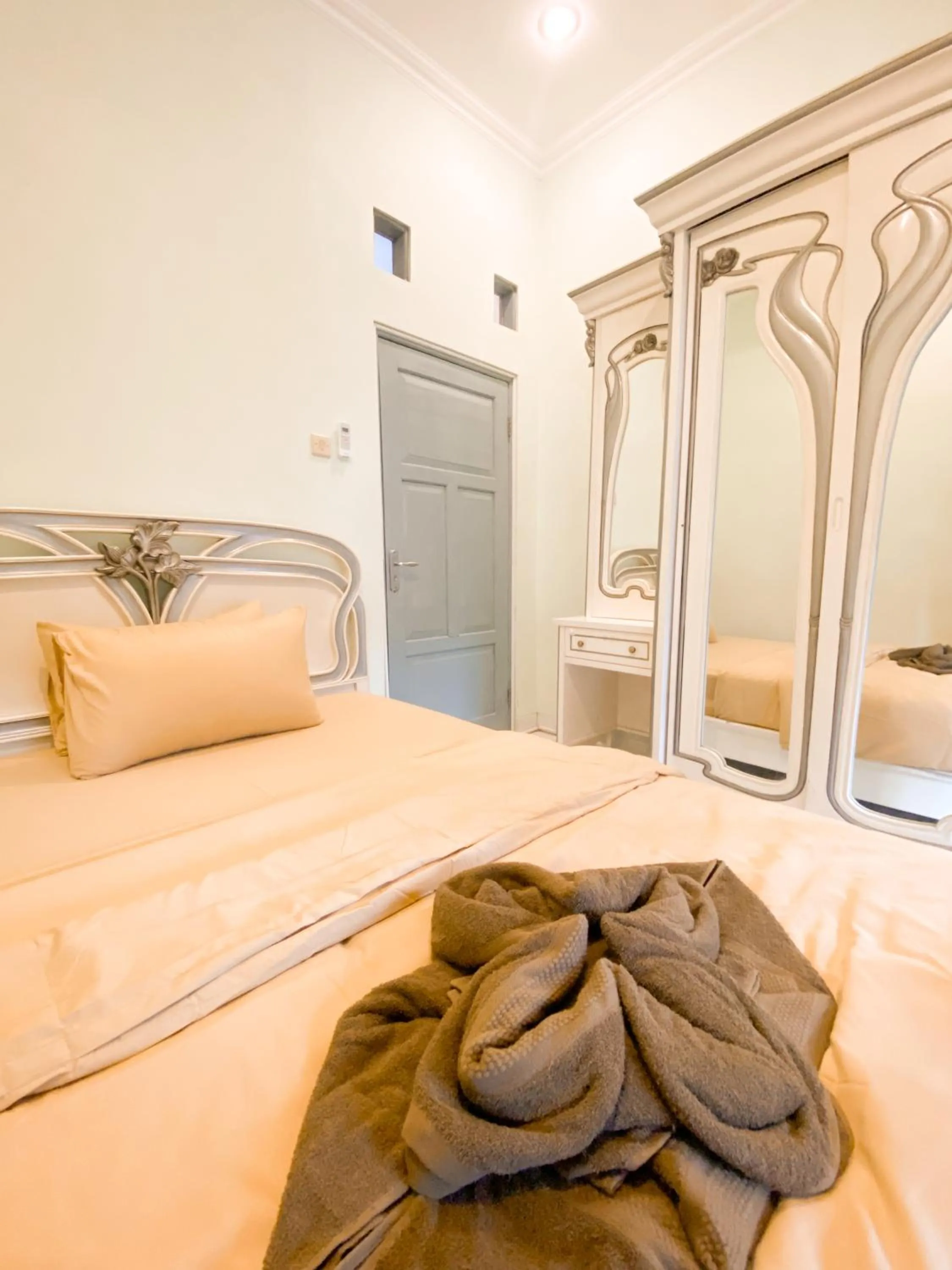 Bed in Homestay Kamar Tamu Gedongkiwo