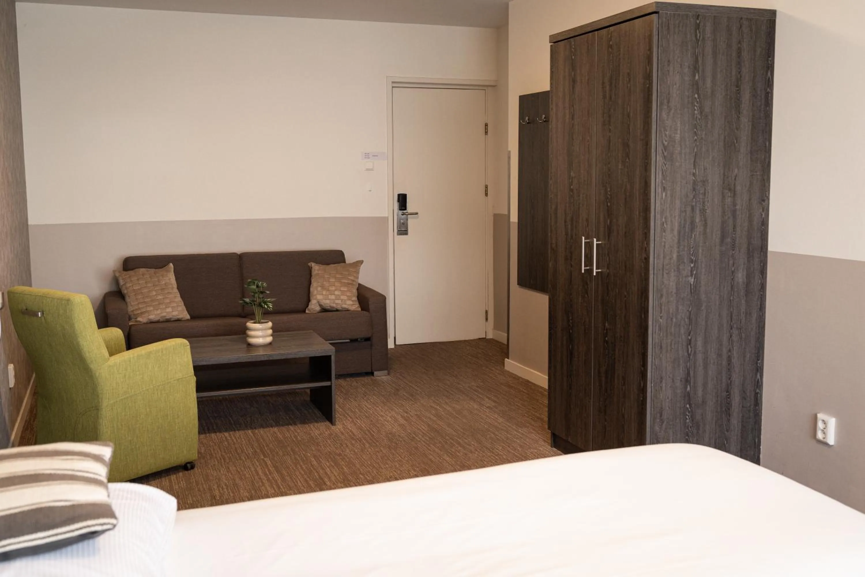 Seating area, Bed in Het Hart van Weesp