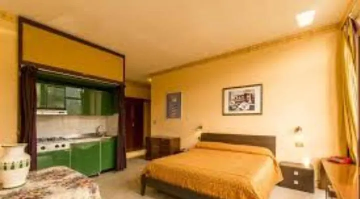 Bed in Cleotto residence case vacanza