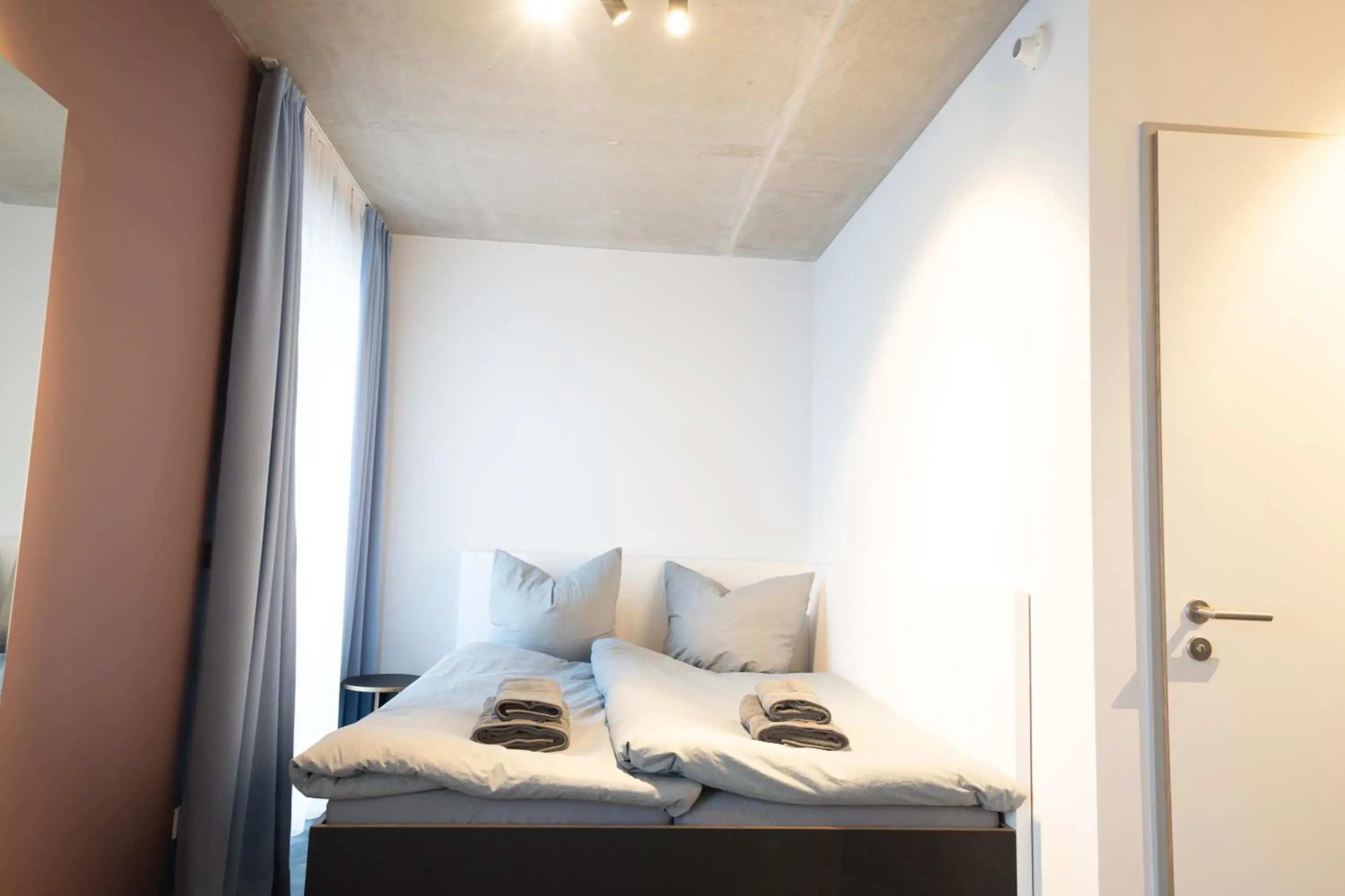 Bed in NEOApartments Bed in NEOApartments