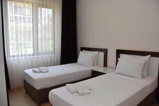 Bed in JURA HOTELS ALTINOLUK THERMAL