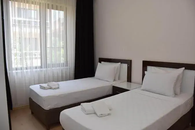 Bed in JURA HOTELS ALTINOLUK THERMAL Bed in JURA HOTELS ALTINOLUK THERMAL