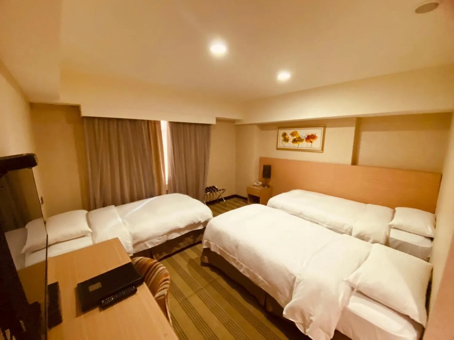 Bed in The Metro Hotel Taichung