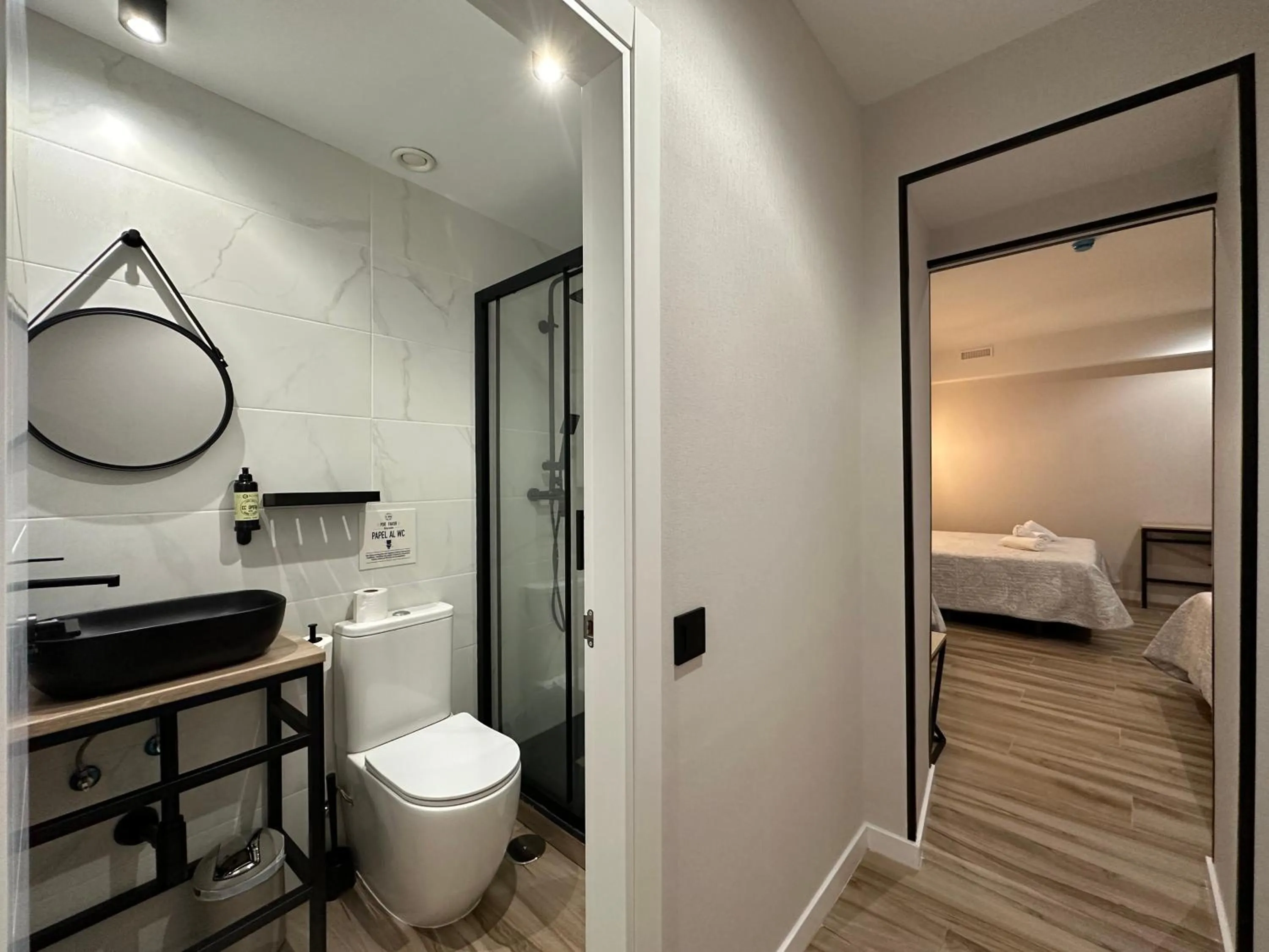 Bathroom, Bed in CC Opera Suites