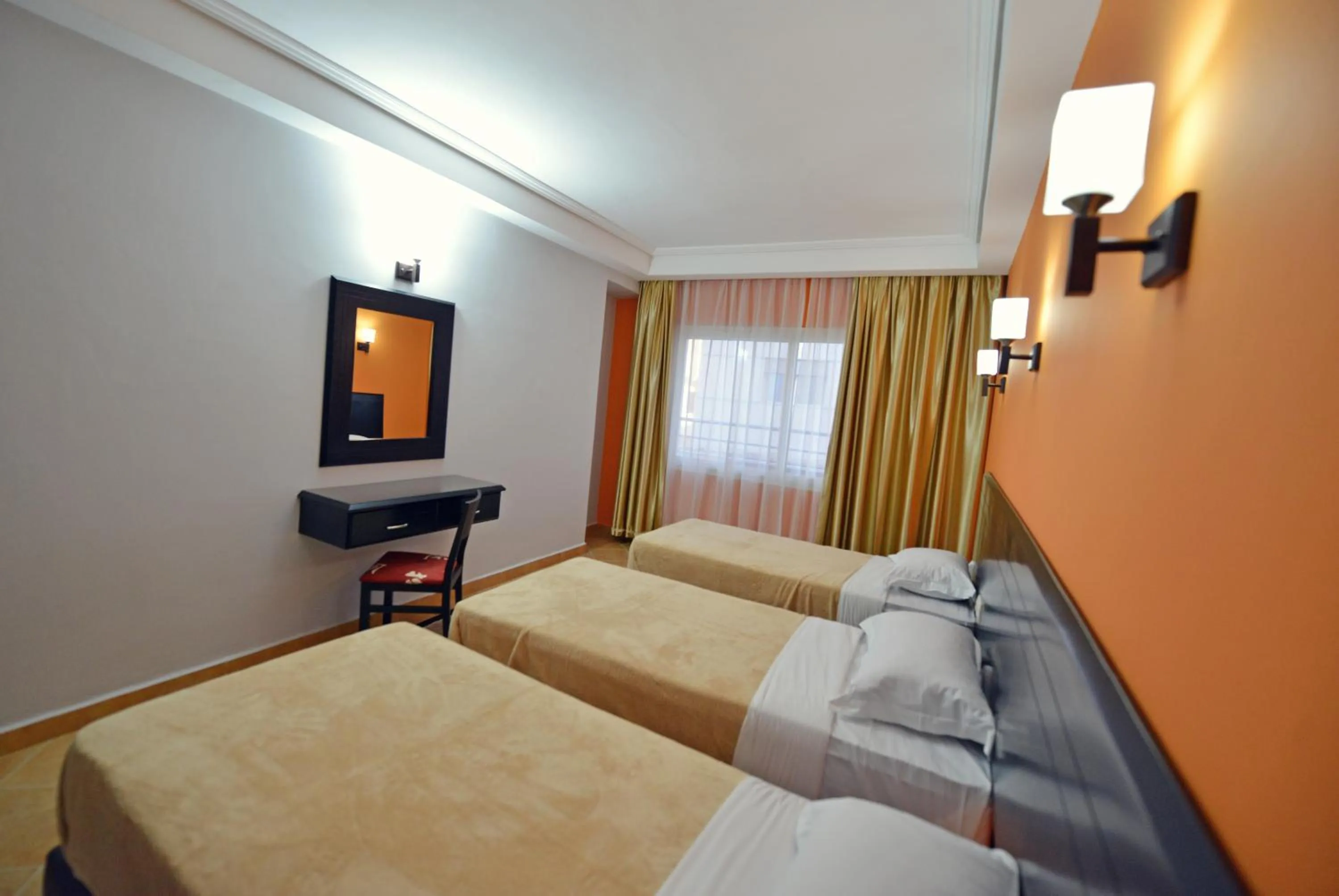 Bed in Hôtel Suite Martil