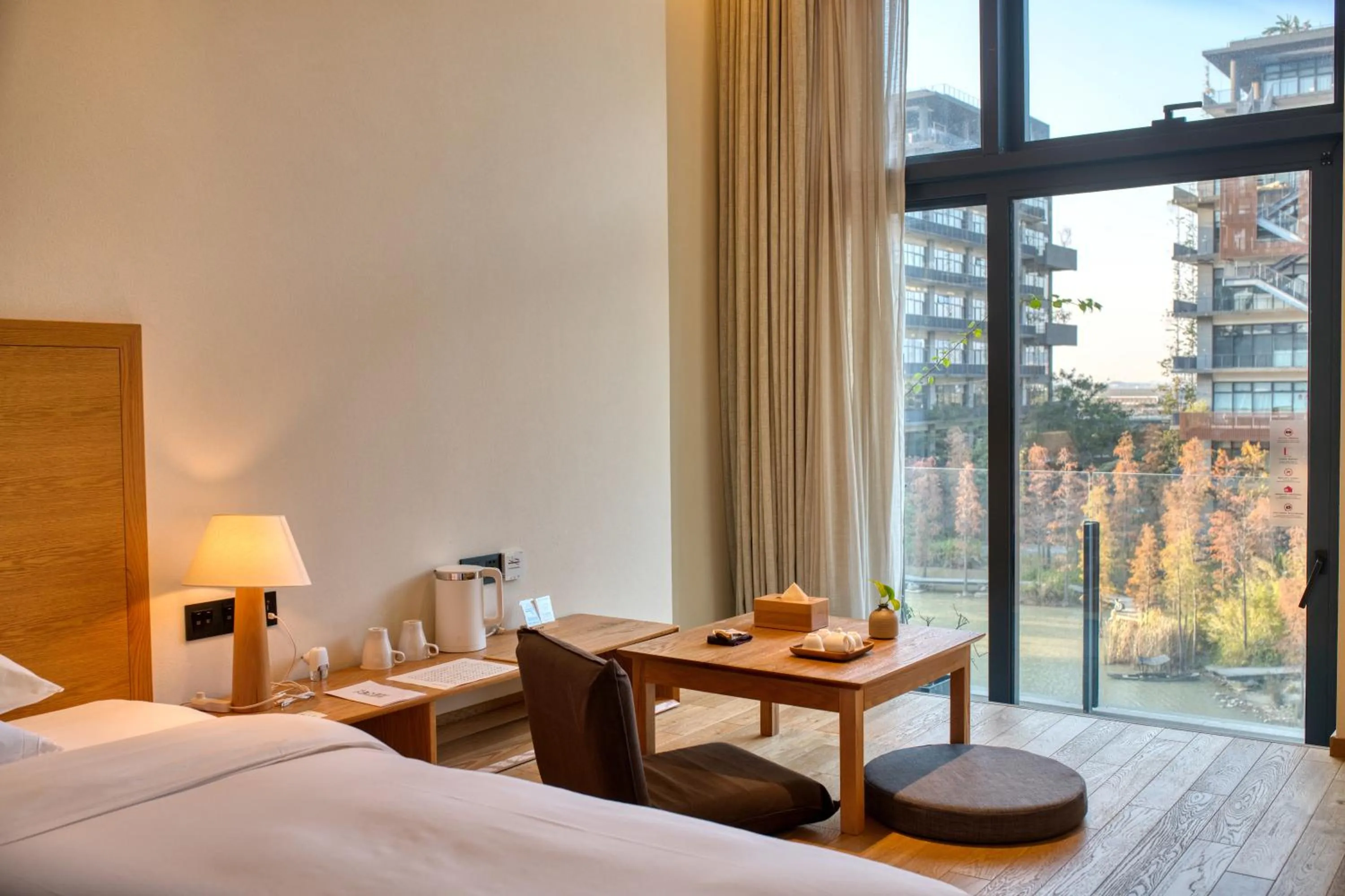 Coffee/tea facilities, Bed in Taihua Wutong Hotel