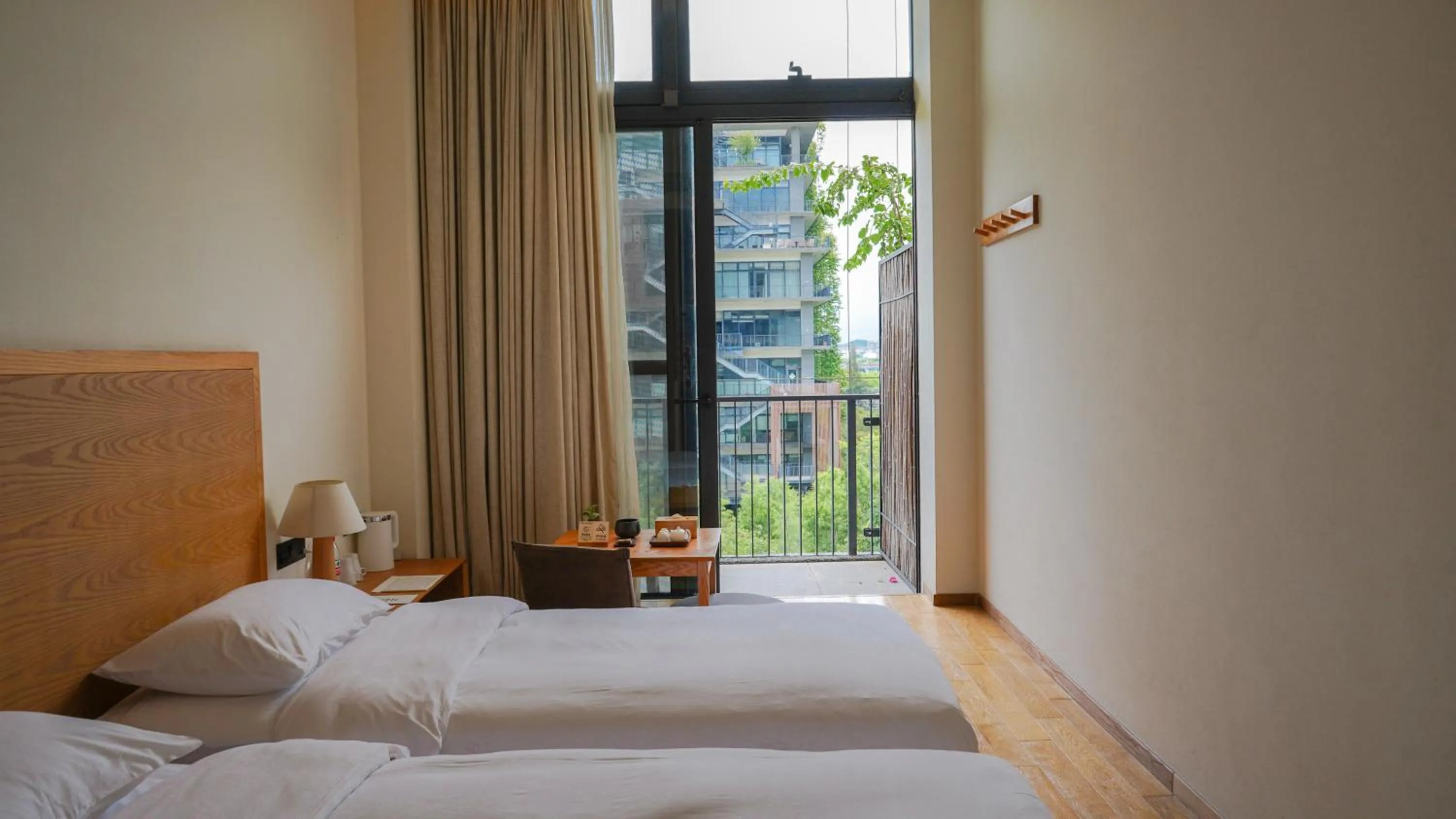 Property building, Bed in Taihua Wutong Hotel