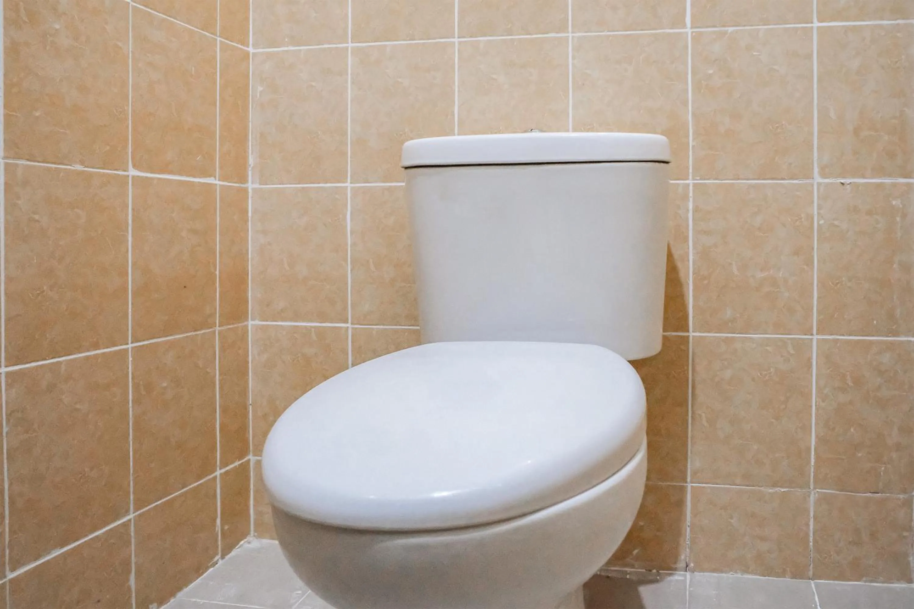 Bathroom in OYO 93332 Kharis Home Stay