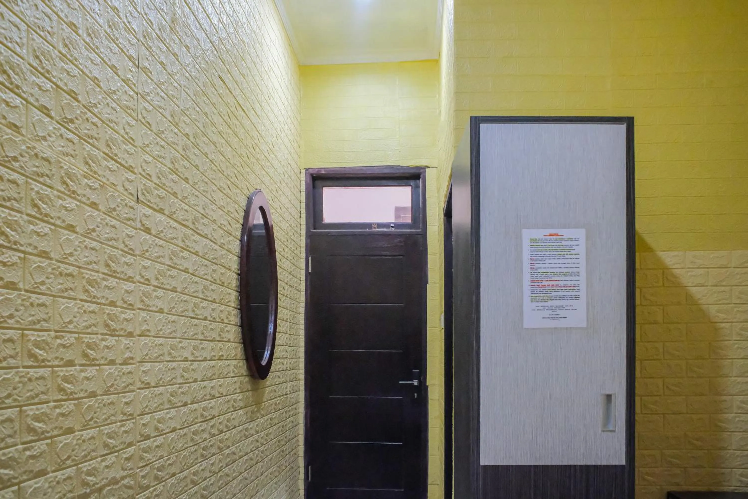 Bedroom in OYO 93333 Rama Home Stay