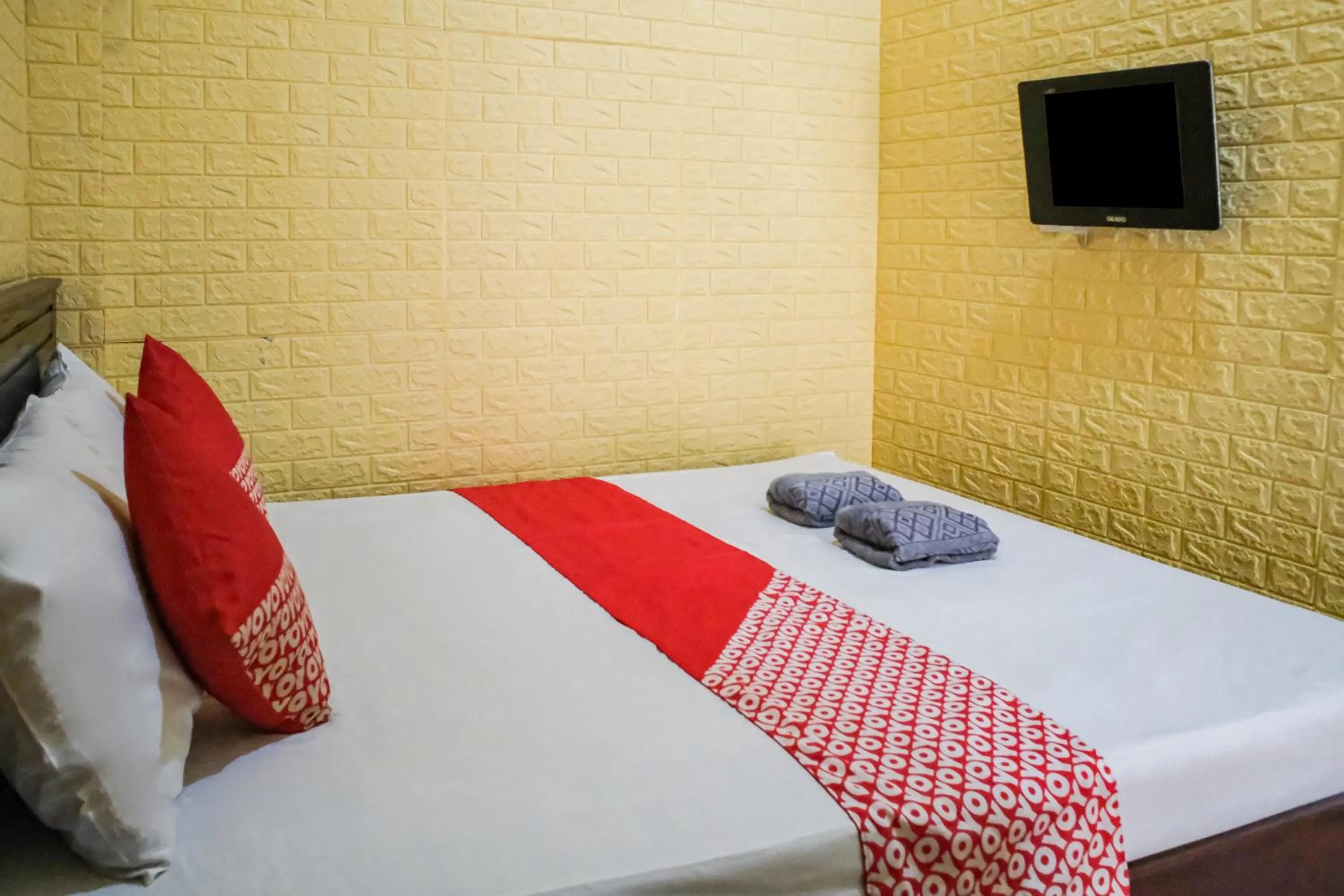 Bedroom, Bed in OYO 93333 Rama Home Stay