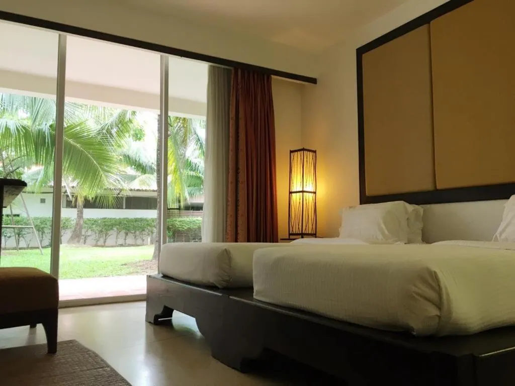 Bed in VANA Wellness Resort