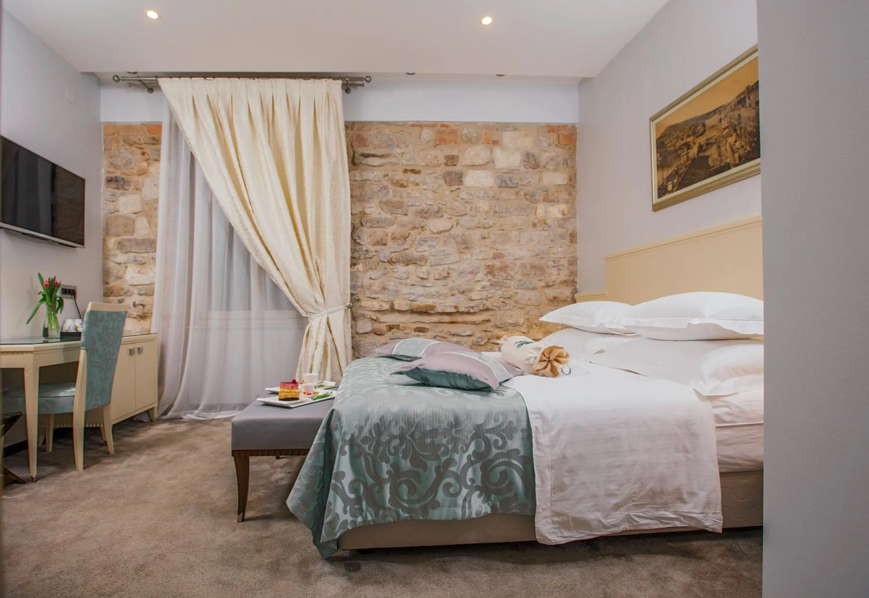 Bed in Heritage Hotel Antique Split