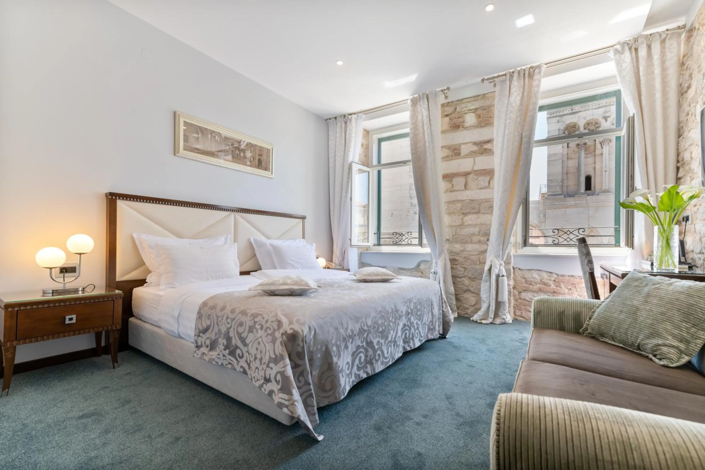 Bed in Heritage Hotel Antique Split