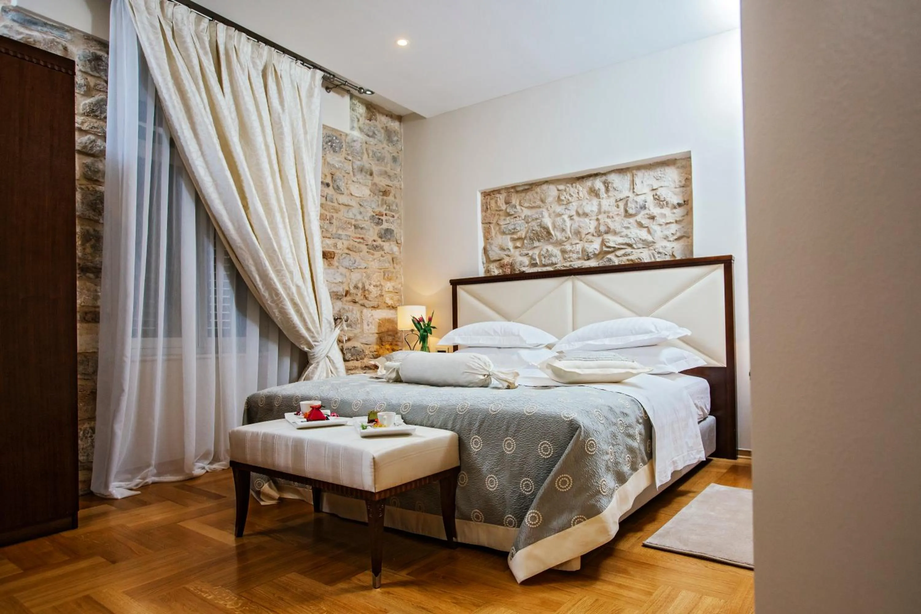 Bed in Heritage Hotel Antique Split