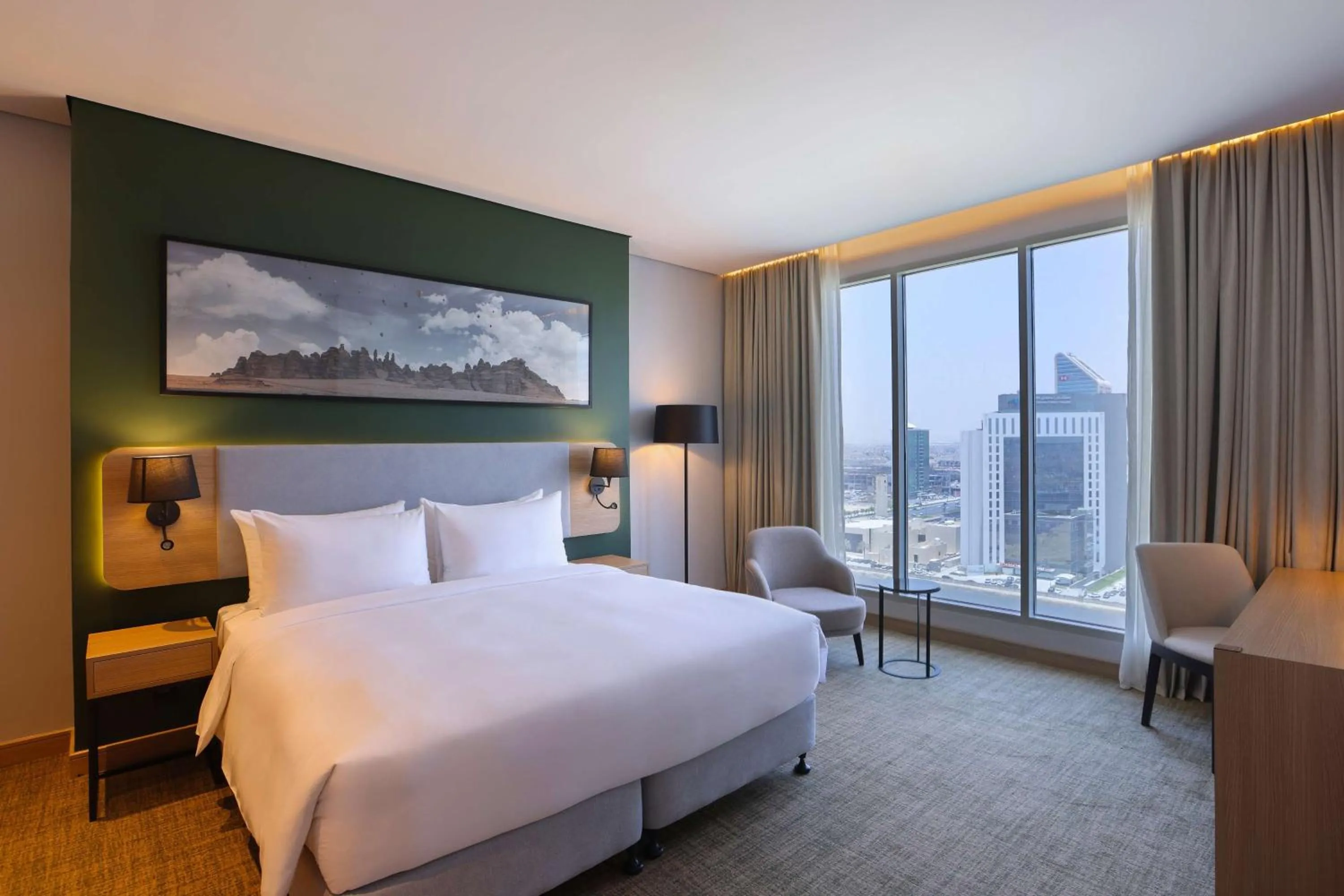 Photo of the whole room, Bed in Radisson Hotel & Residence Riyadh Olaya