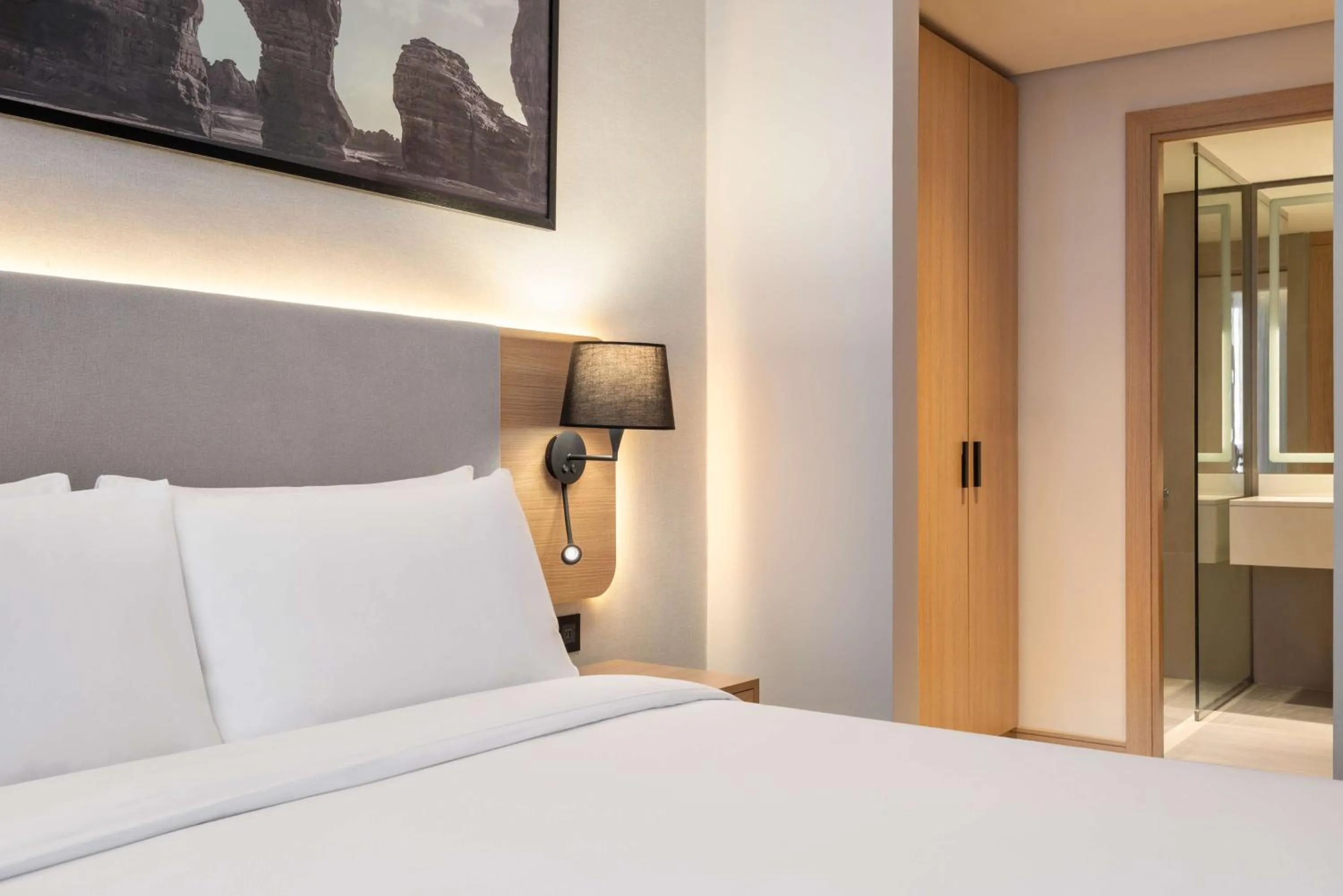 Photo of the whole room, Bed in Radisson Hotel & Residence Riyadh Olaya