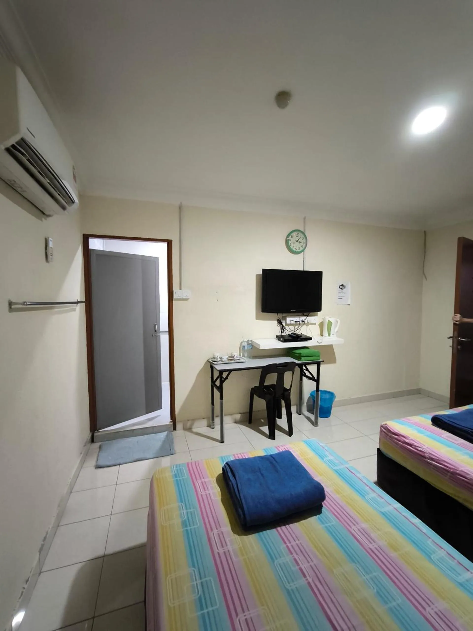 Bedroom in OYO 90895 Hotel Ikia