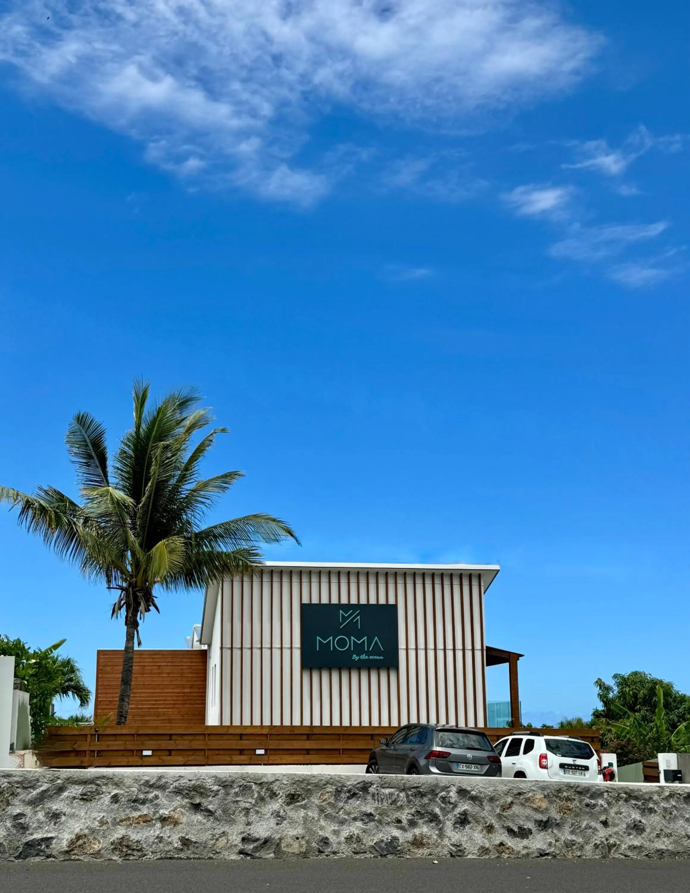 Property logo or sign in Le Moma by the ocean
