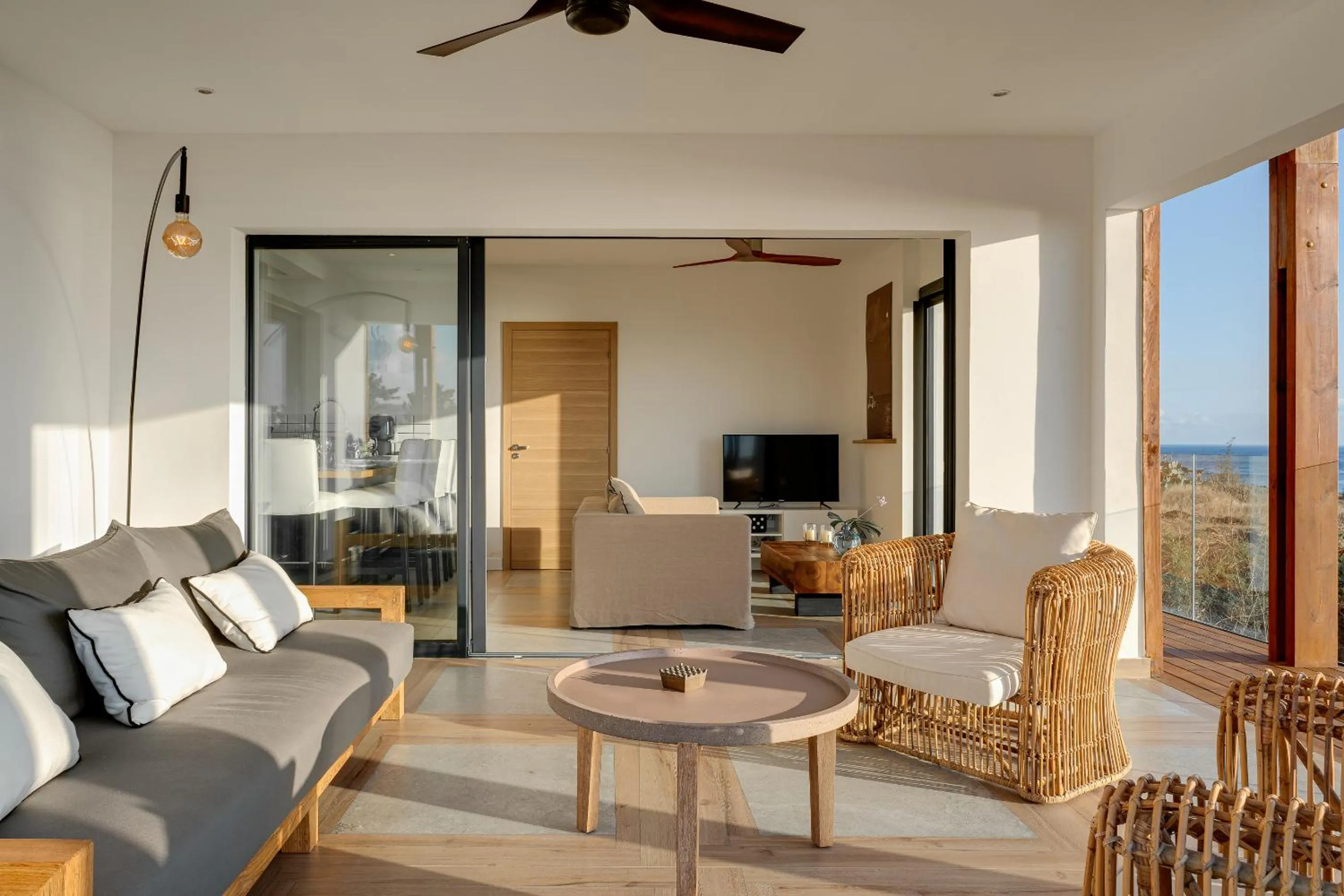 Communal lounge/ TV room in Le Moma by the ocean