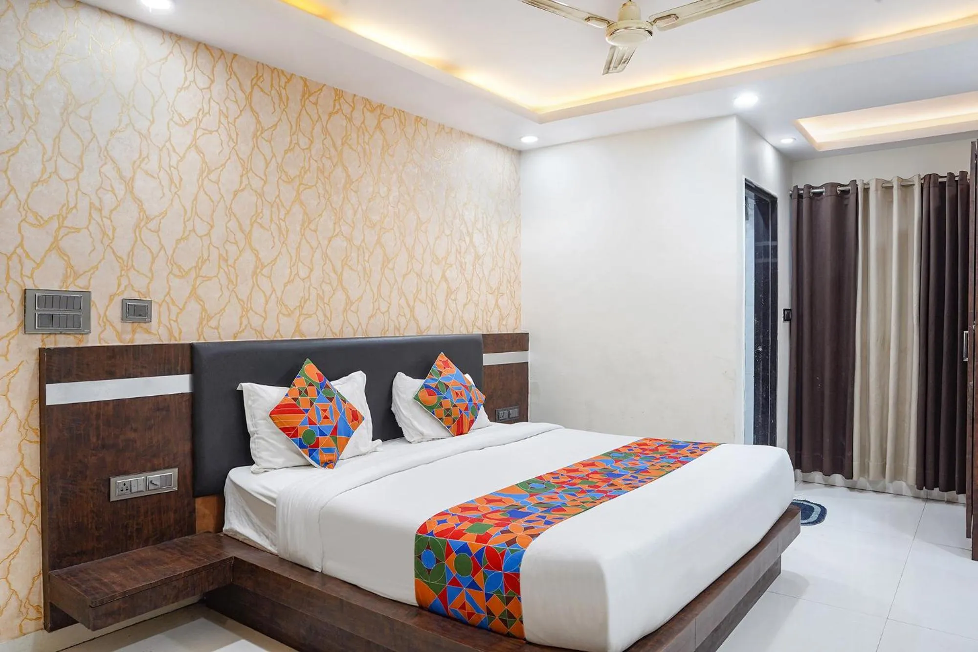 Bed in FabHotel Jalsa DLX