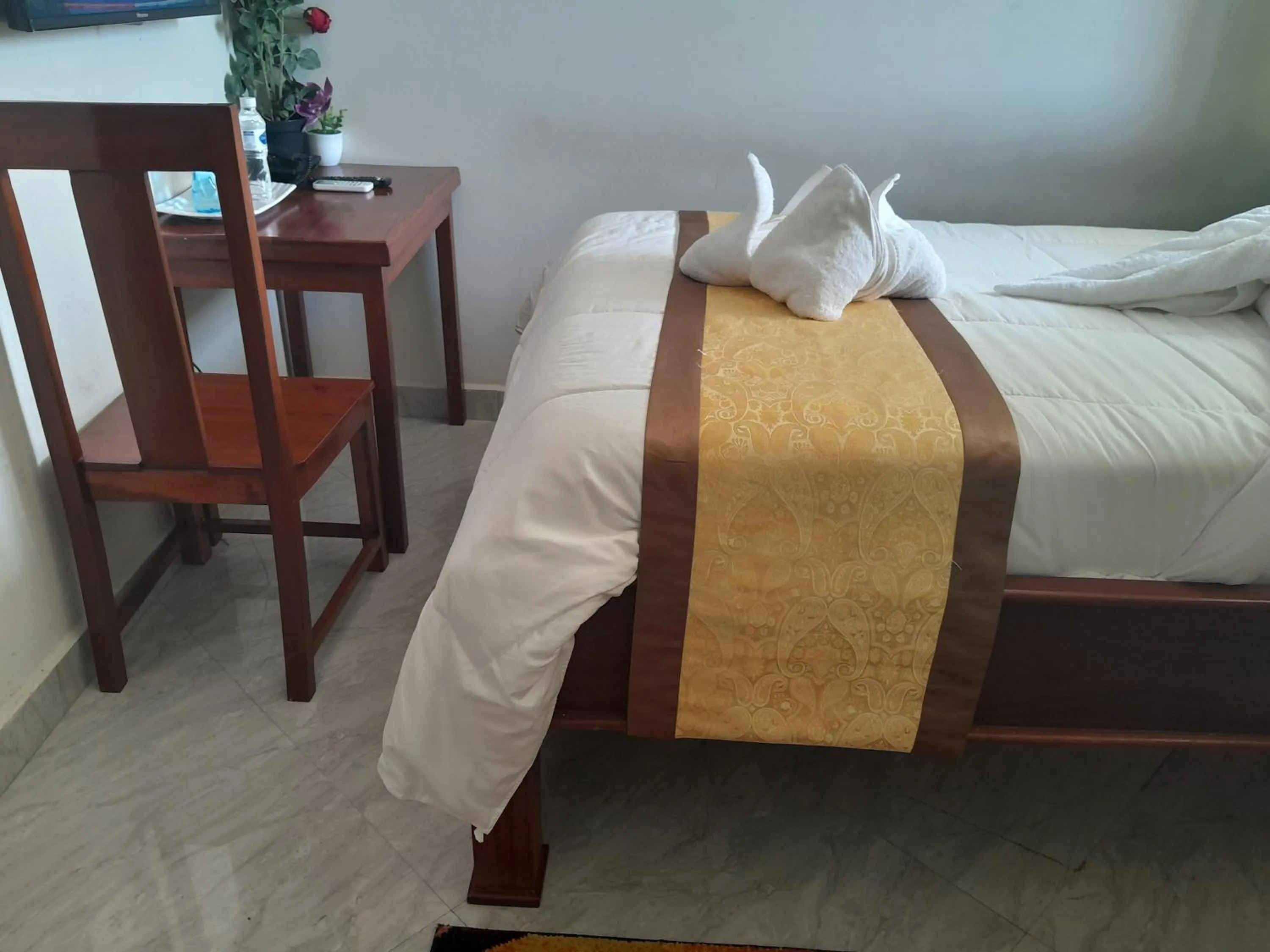 Bed in PALAZZO GARDEN RESORT MATEMA