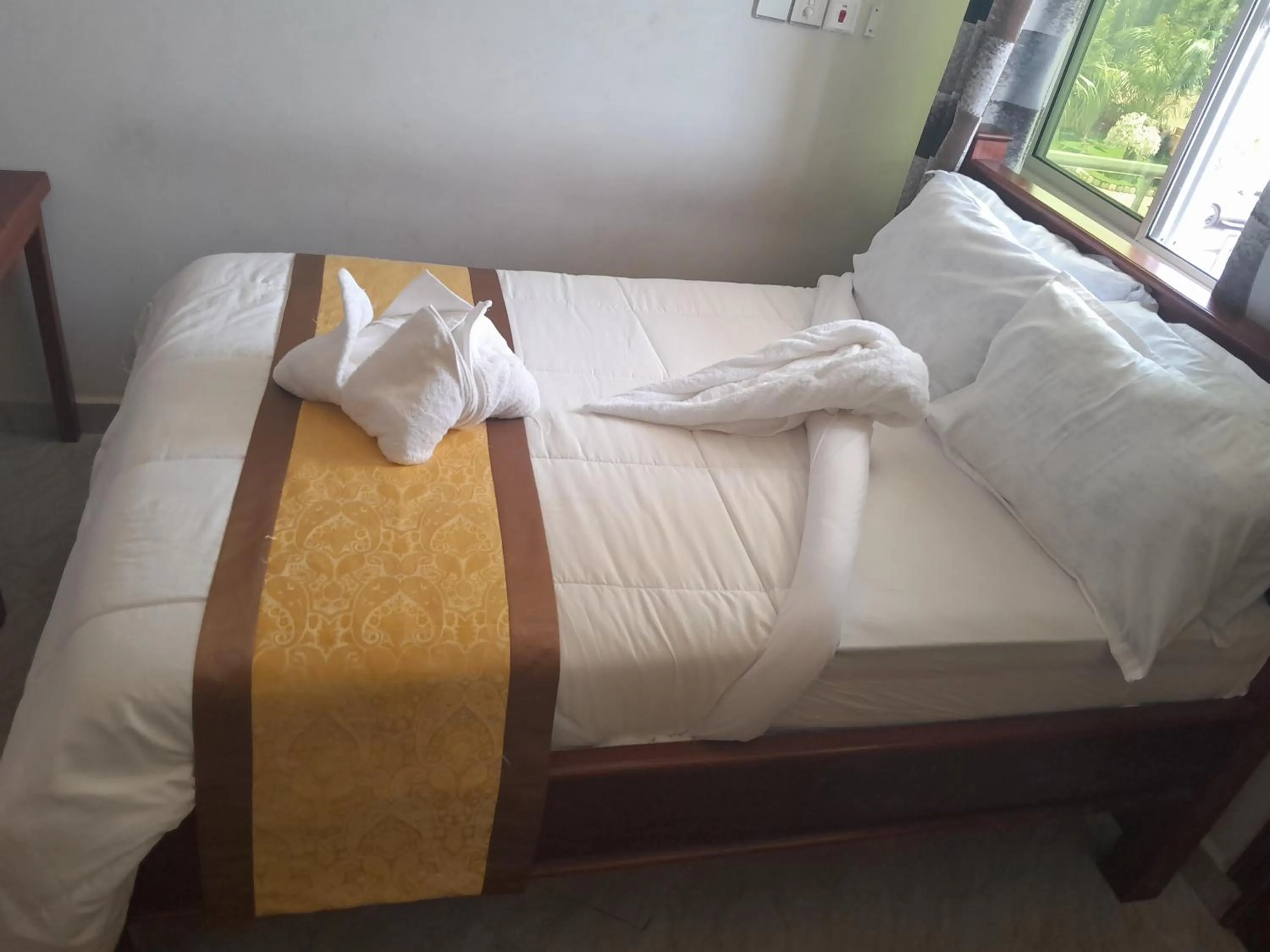 Bed in PALAZZO GARDEN RESORT MATEMA