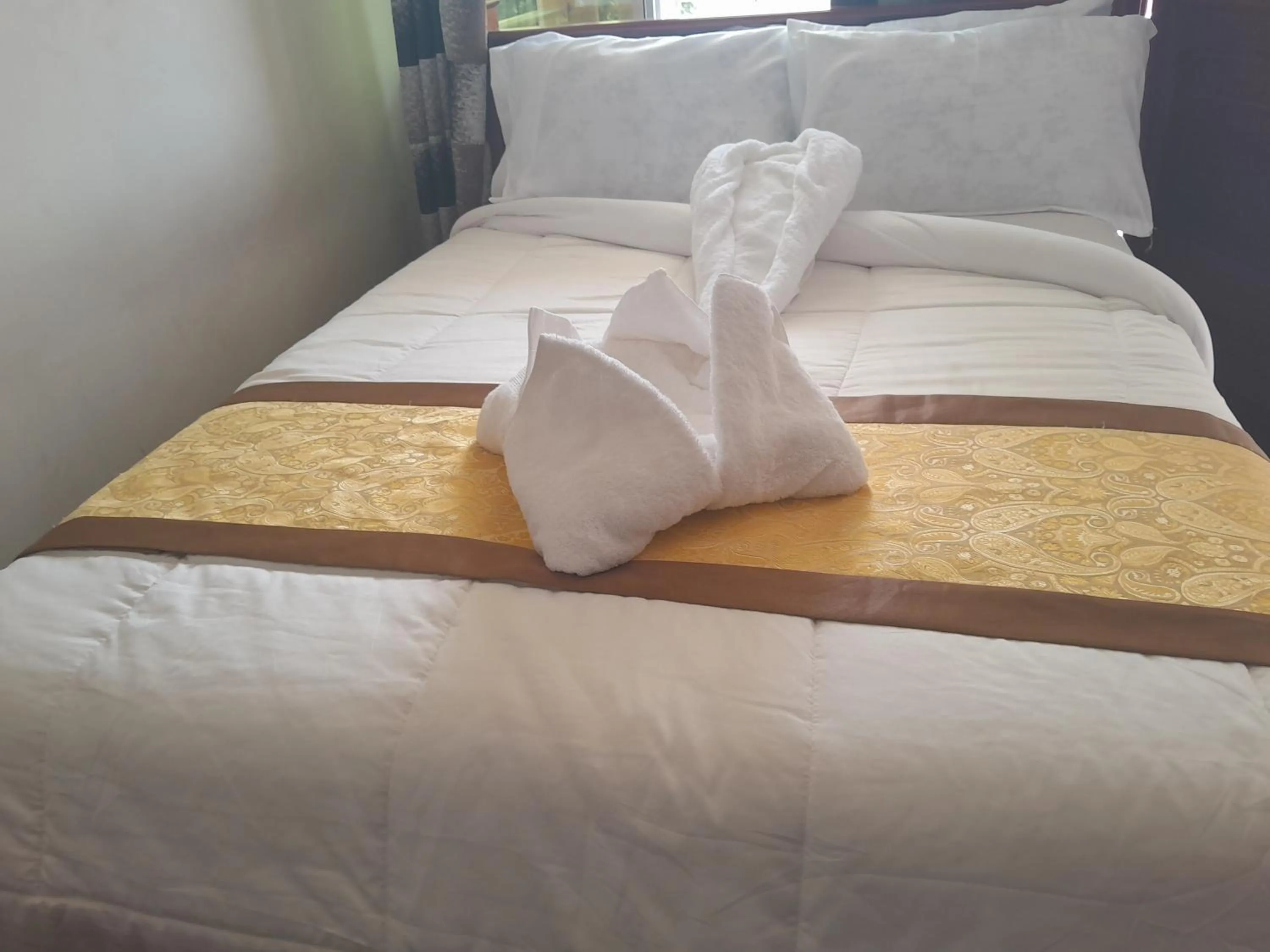 Bed in PALAZZO GARDEN RESORT MATEMA