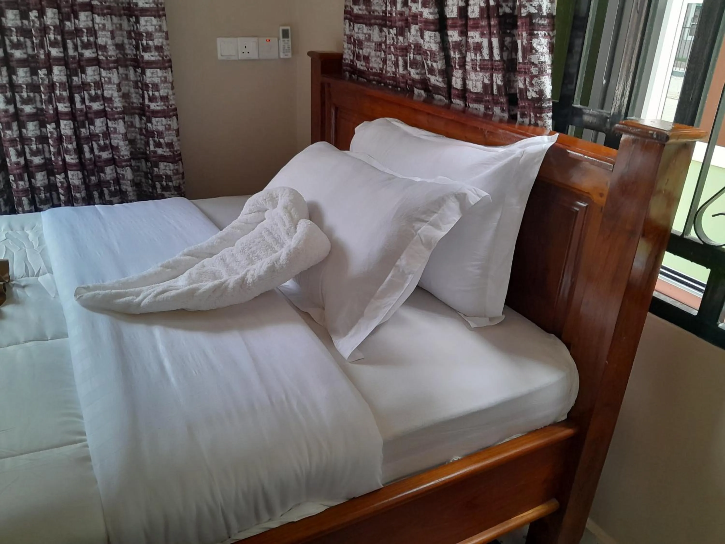 Bed in PALAZZO GARDEN RESORT MATEMA