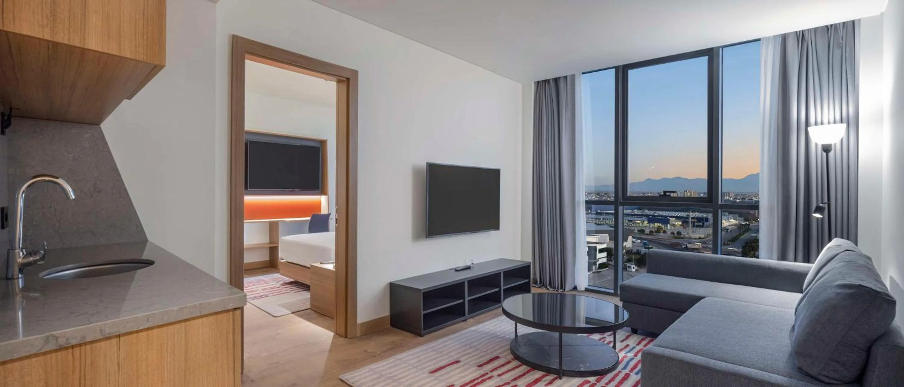 Living room, Bed in Hampton by Hilton Antalya Airport